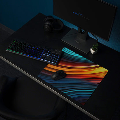 Vibrant abstract wave gaming mouse pad with rainbow gradient and non-slip edges