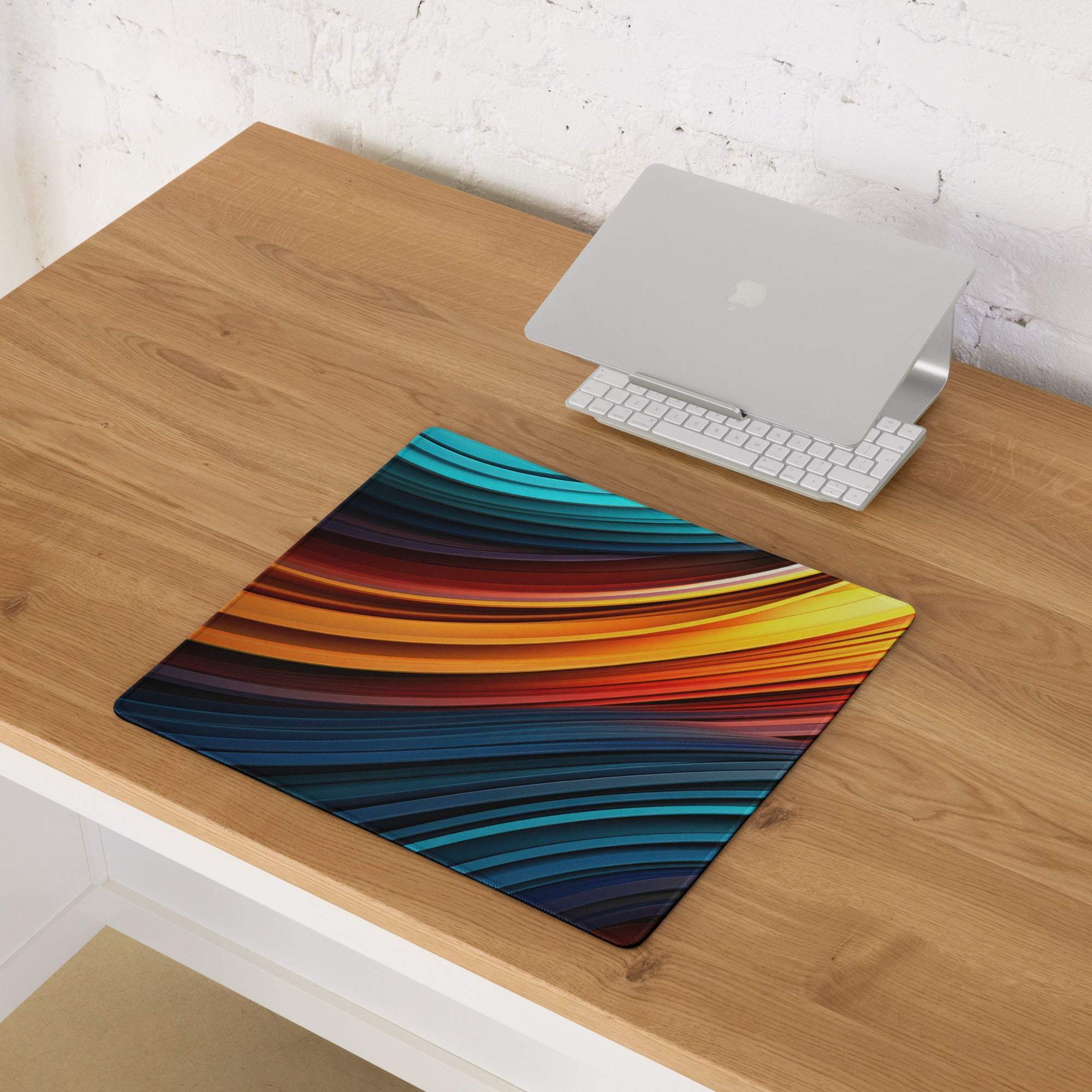 Vibrant abstract wave gaming mouse pad with flowing stripes in blue, teal, orange, red, yellow, large surface, non-slip edge stitching