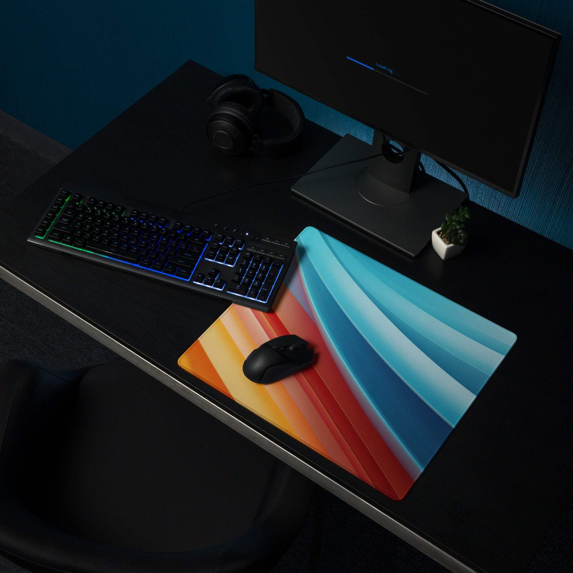 Vibrant gradient large gaming mouse pad with orange red blue stripes non-slip base stitching