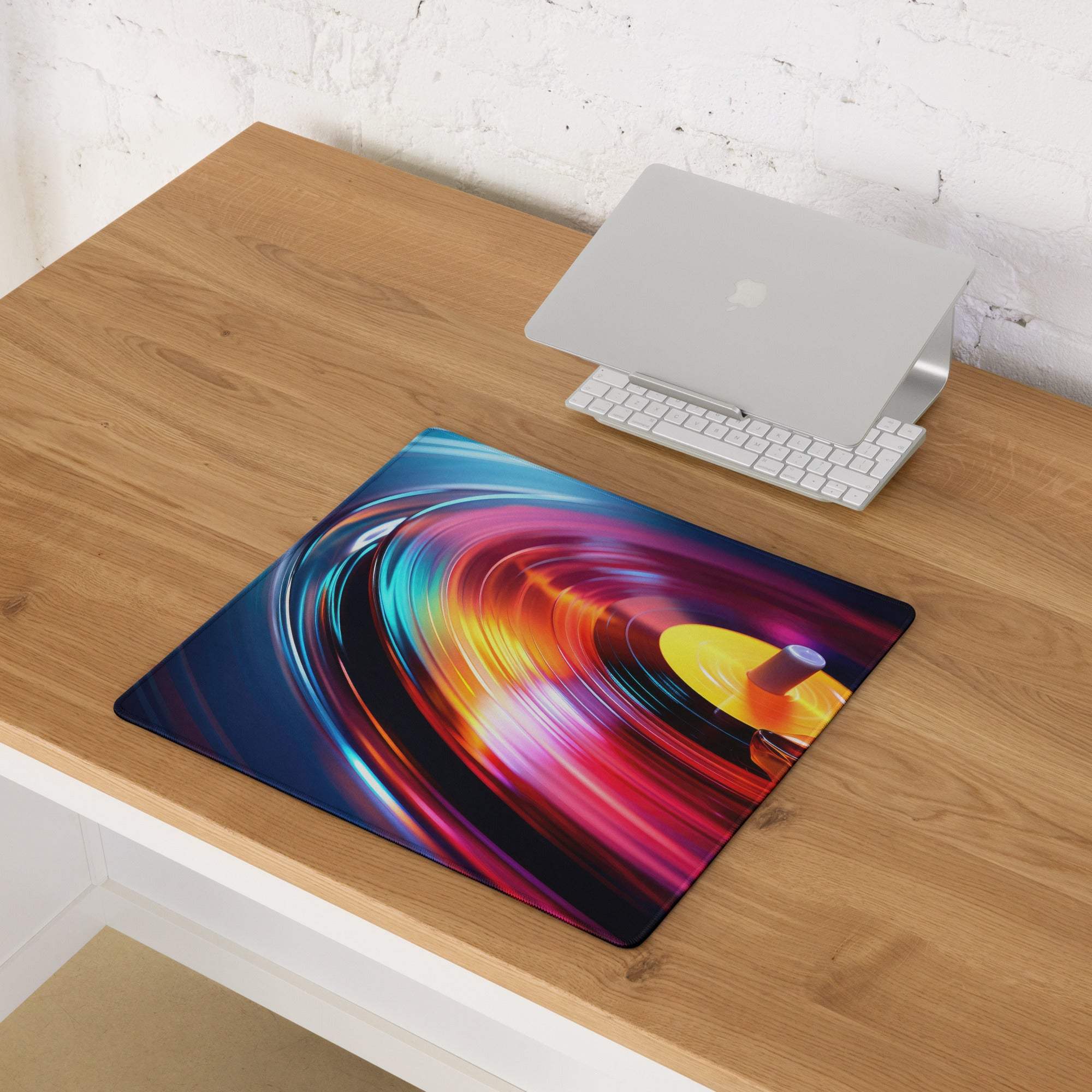 Vibrant vinyl turntable artwork gaming mouse pad with rainbow swirls, large surface, non-slip base