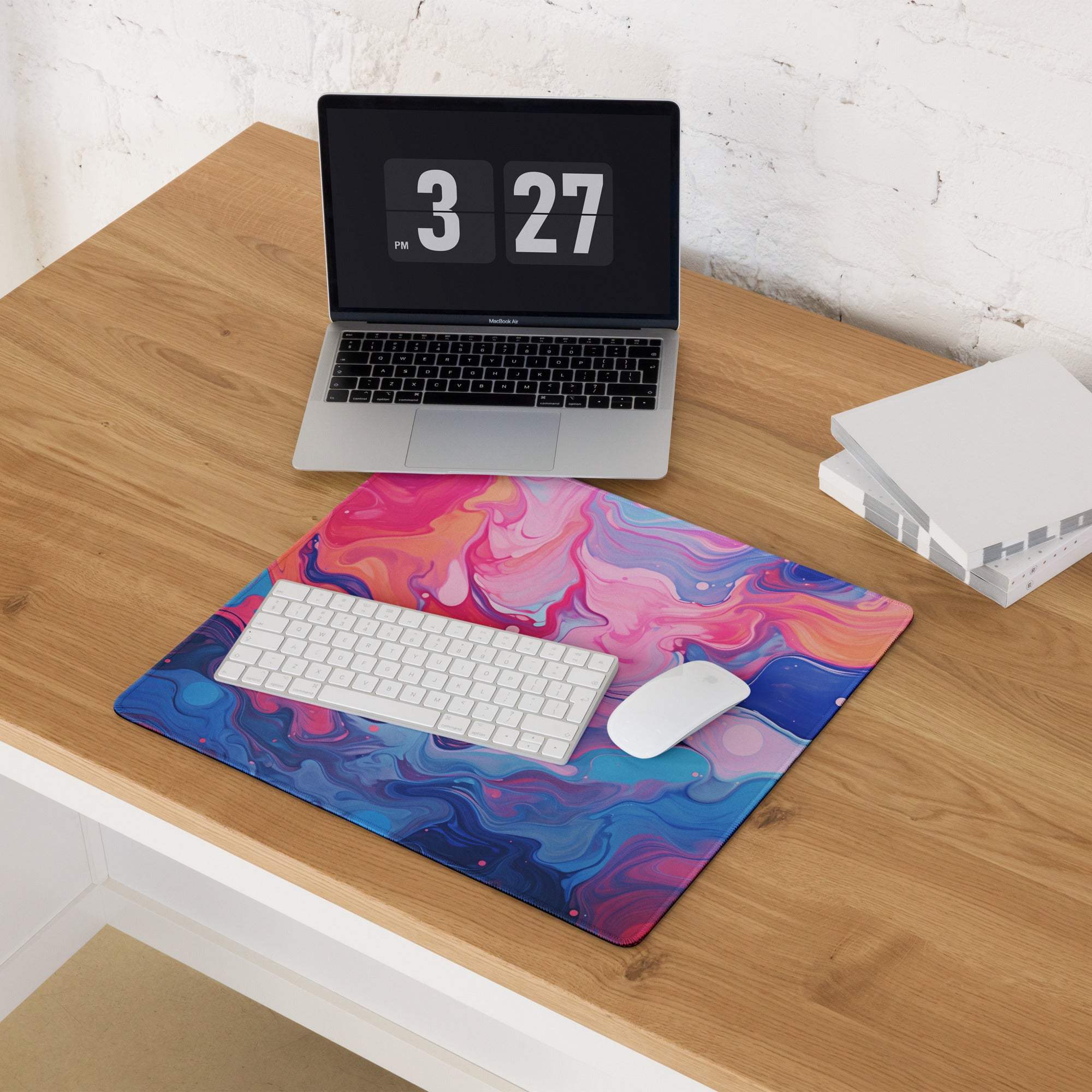 Vibrant pink blue purple swirl gaming mousepad with white keyboard mouse