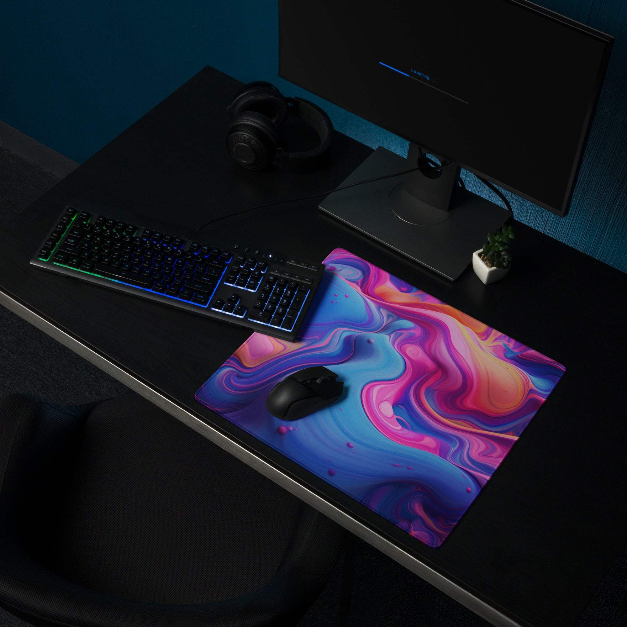 Vibrant pink purple blue swirl gaming mouse pad with non-slip base edge stitching