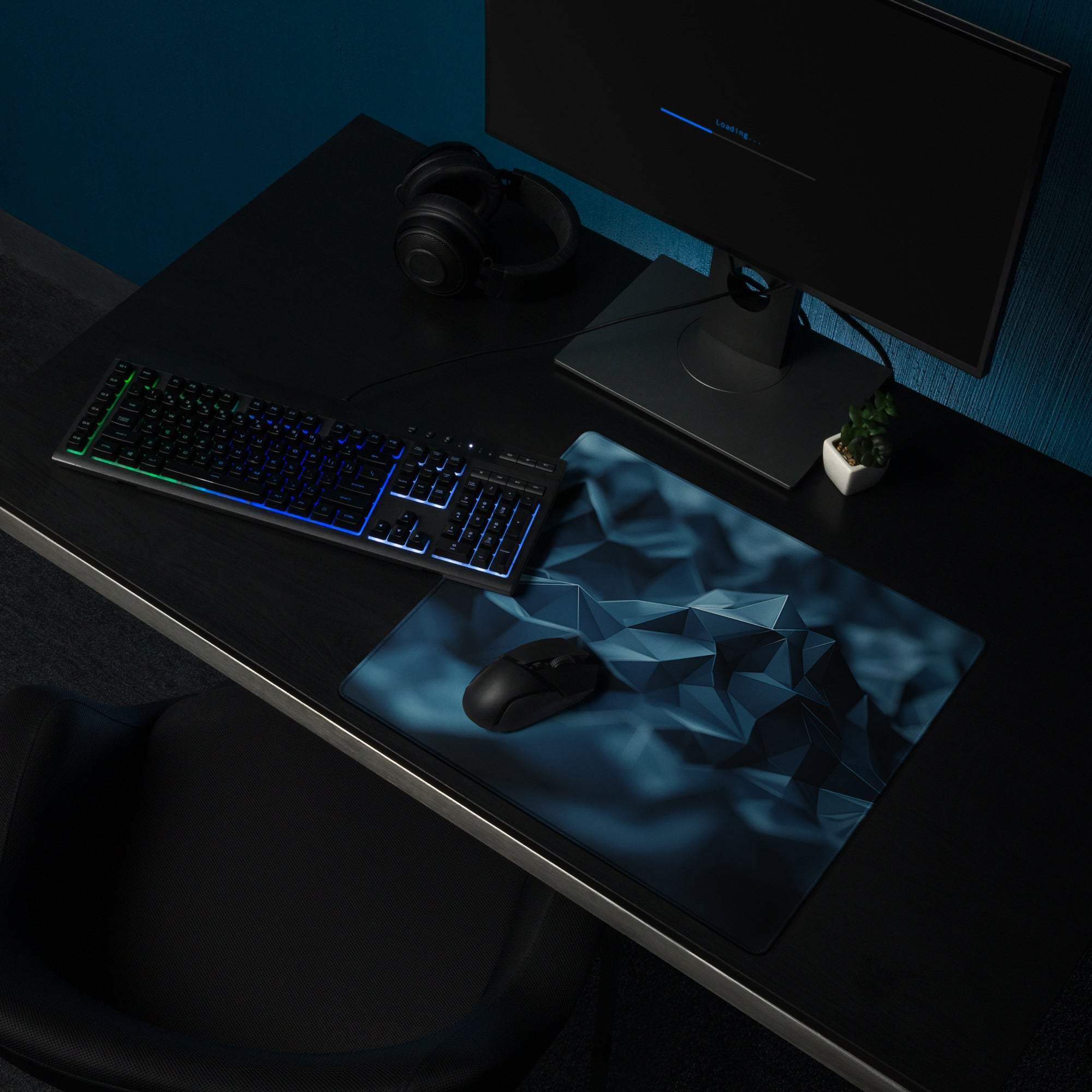 Blue geometric mountain gaming mouse pad with non-slip base and stitched edges