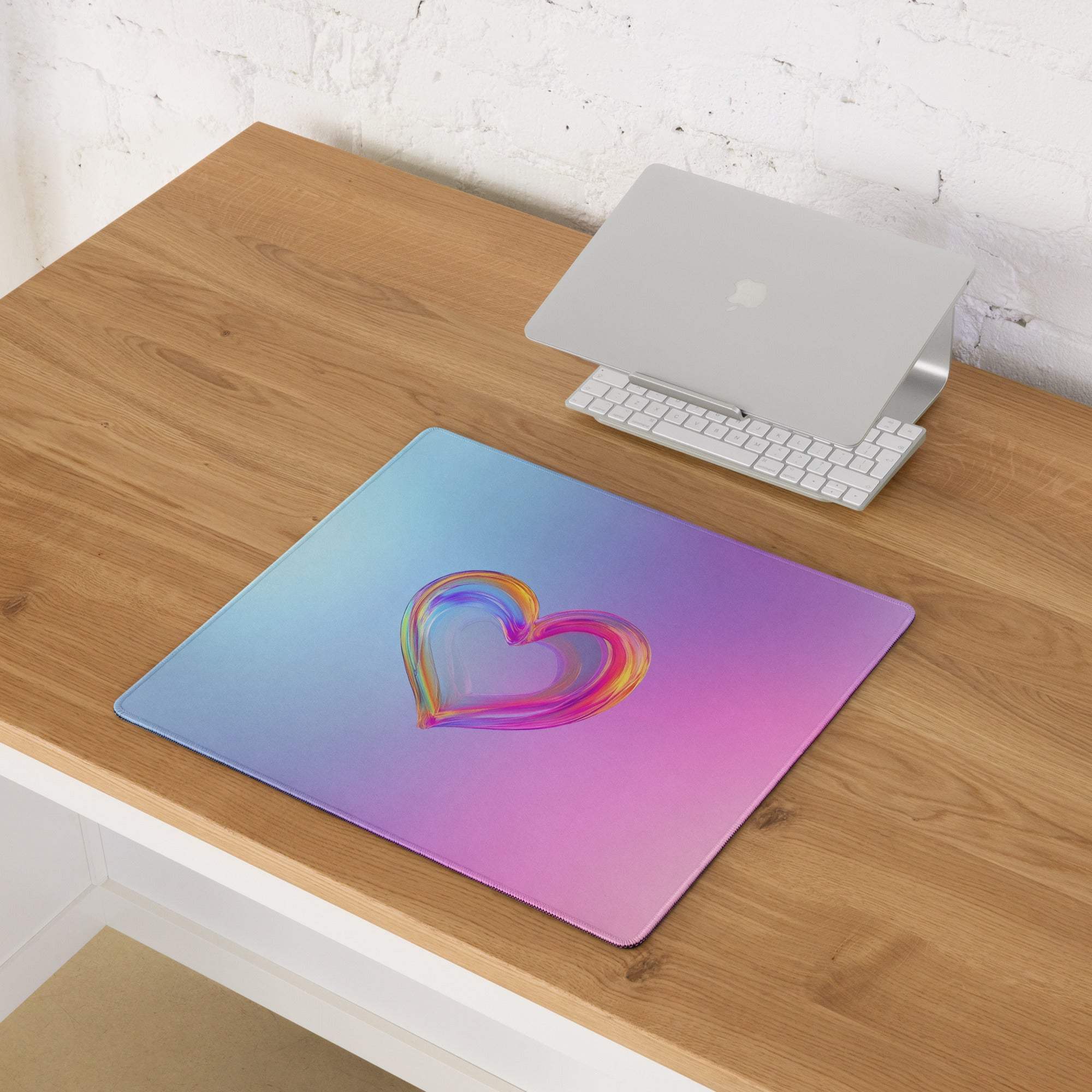 Pastel gradient heart gaming mouse pad with rainbow center, non-slip base