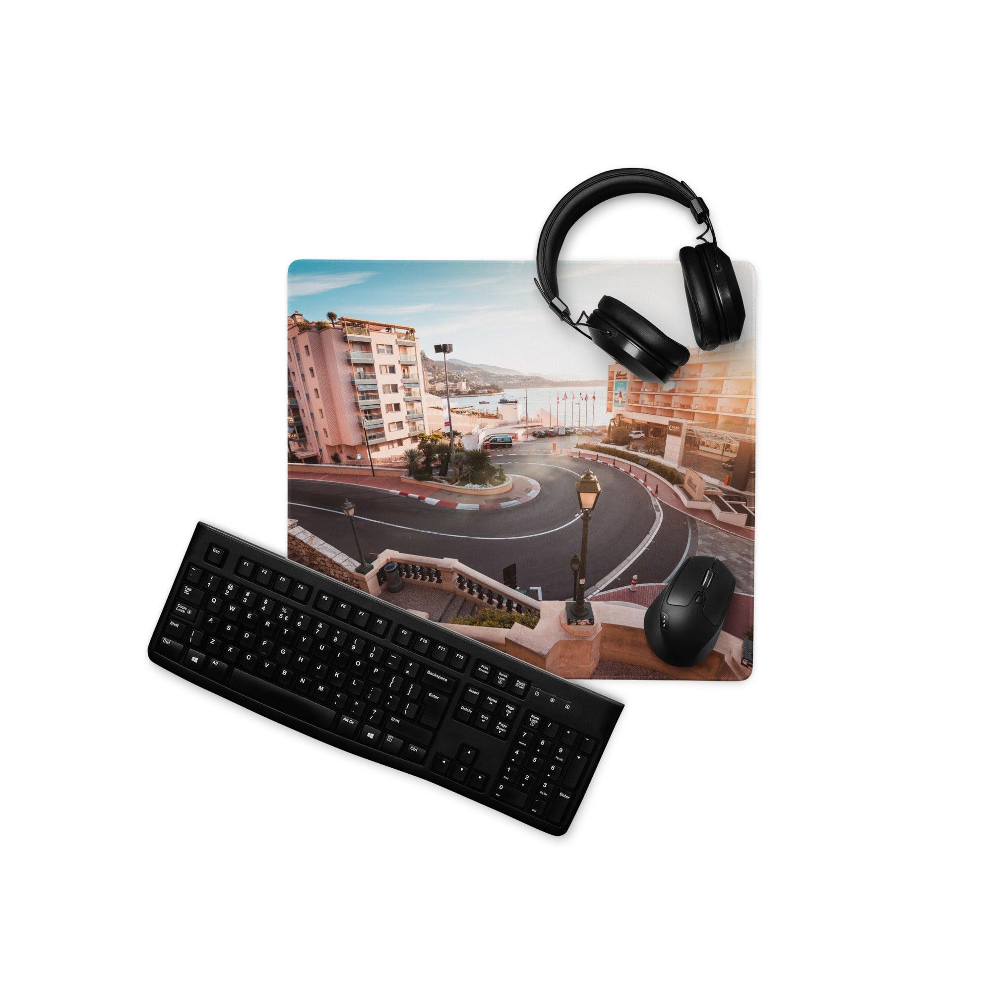 Black matte qwerty keyboard on urban sunset cityscape gaming mouse pad