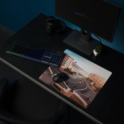 Urban sunset cityscape gaming mouse pad with stitched edges and non-slip base