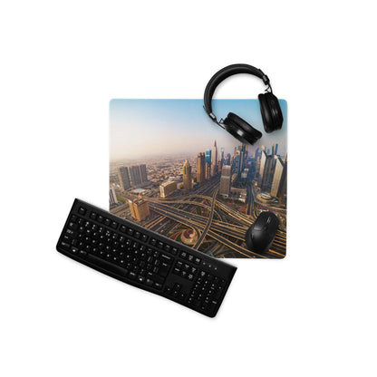 Large warm sunset urban skyline gaming mousepad with black keyboard, mouse, headphones