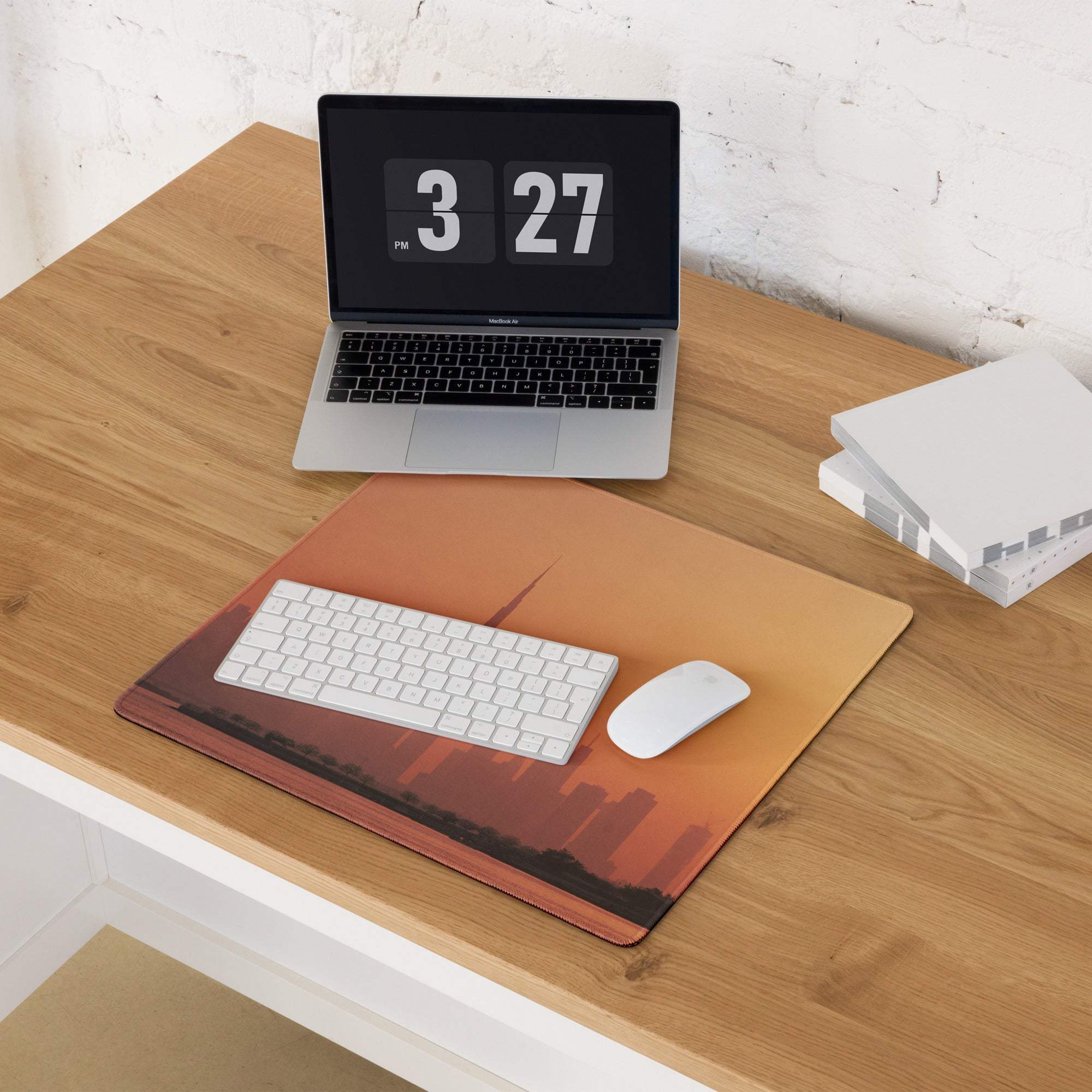 Orange sunset city skyline gaming mouse pad with textured edge stitching