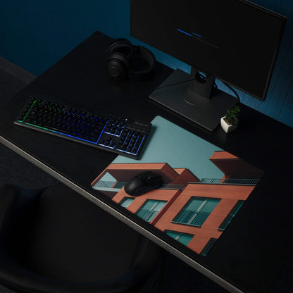 Sleek large edge-stitched gaming mouse pad with orange teal brick buildings design