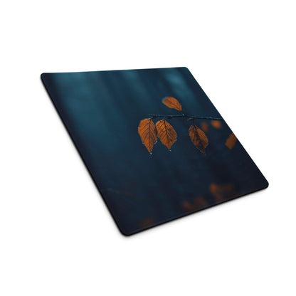 Large moody night scene leaves gaming mouse pad with autumn leaves on teal background