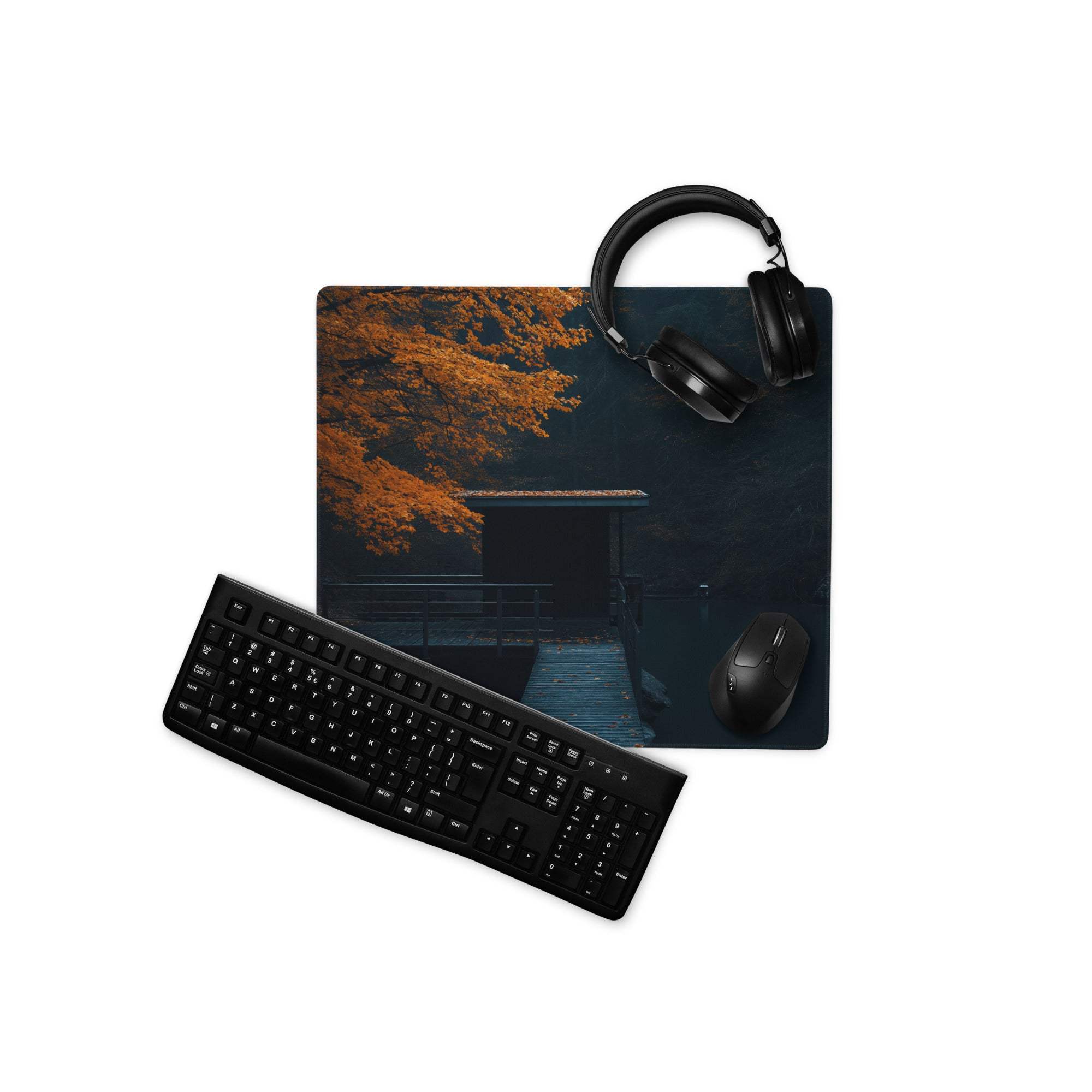 Black matte finish keyboard on Moody Autumn Forest gaming mouse pad