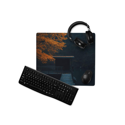 Black matte finish keyboard on Moody Autumn Forest gaming mouse pad