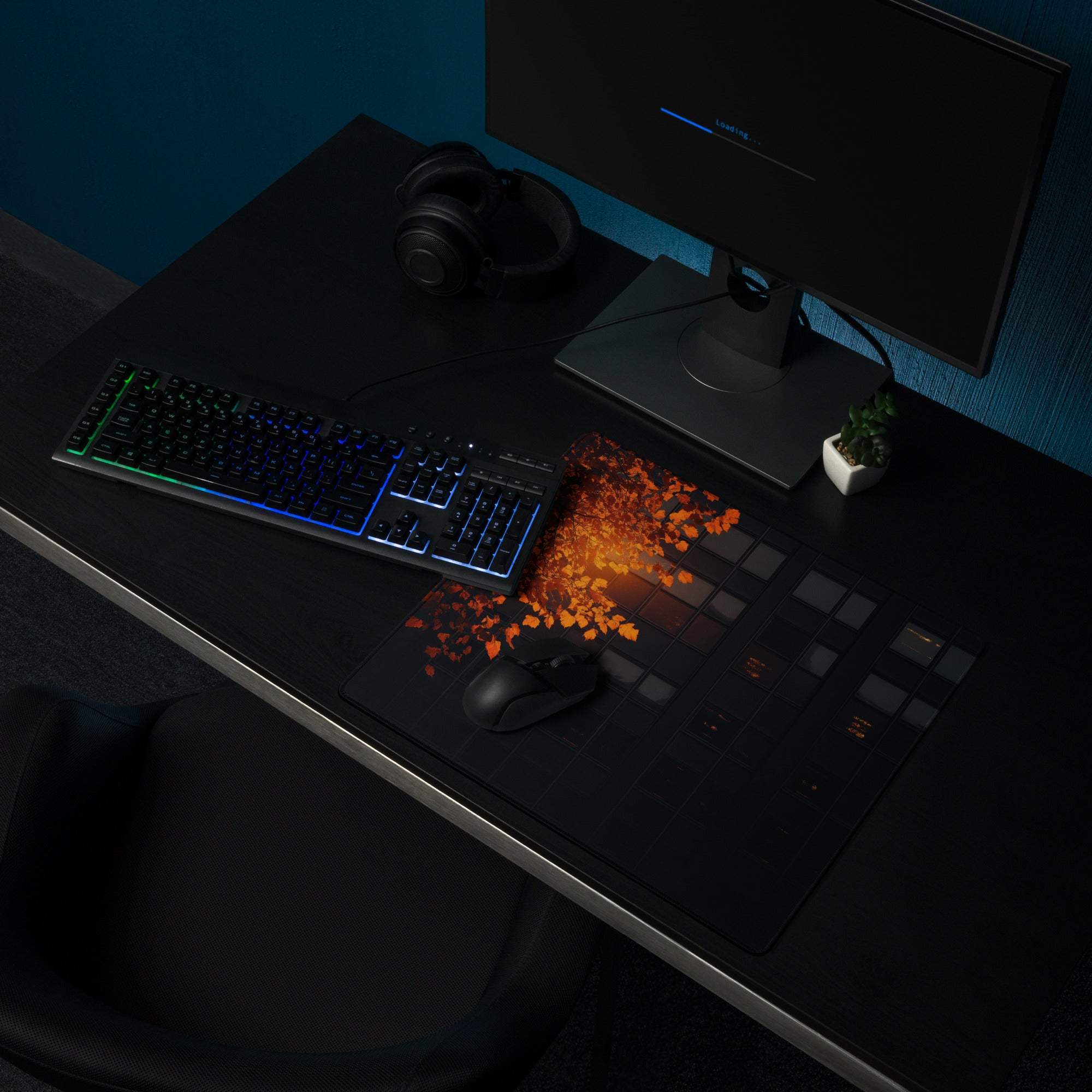 Black moody autumn leaves gaming mouse pad with non-slip backing and RGB keyboard