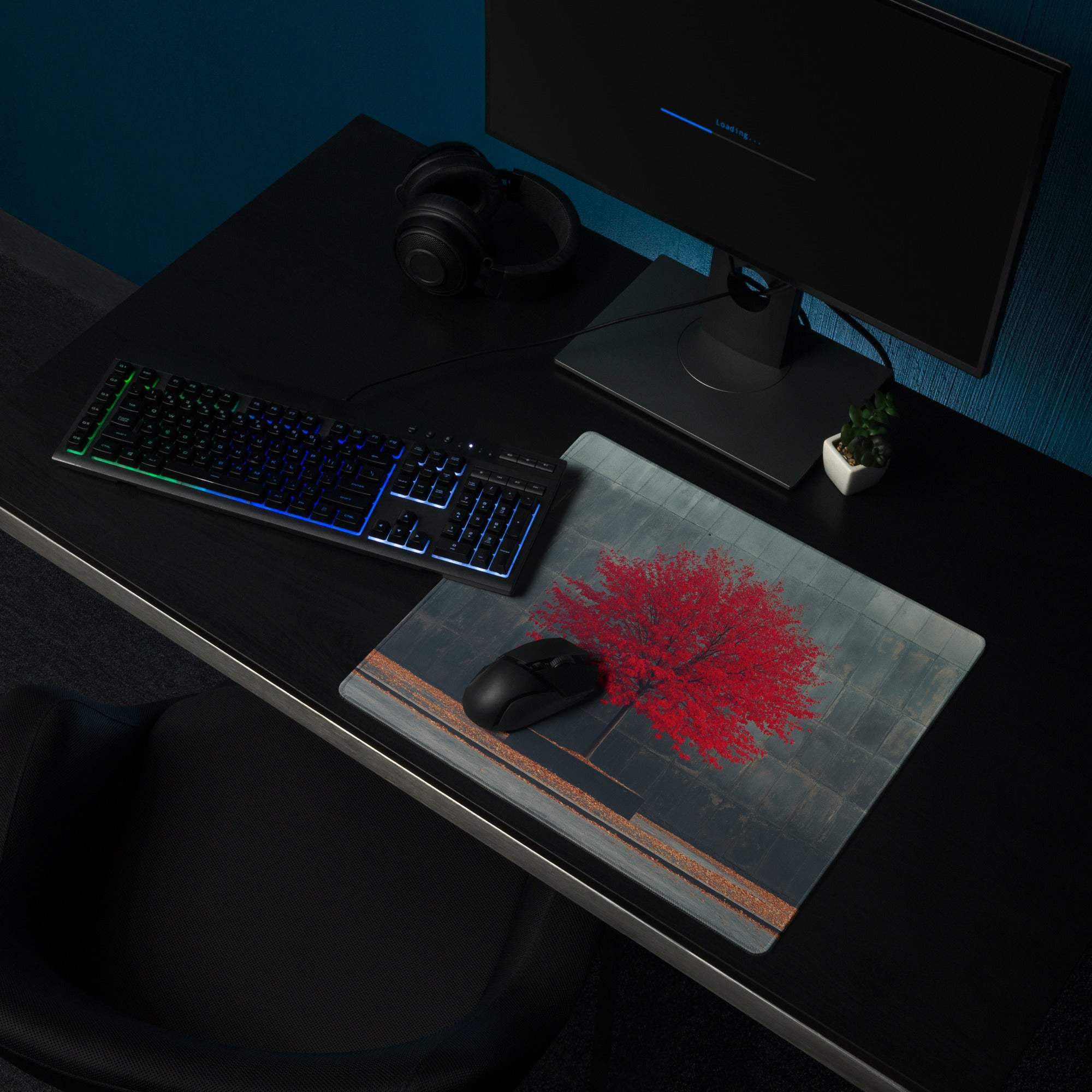 Artistic red tree gaming mouse pad on gray brick background