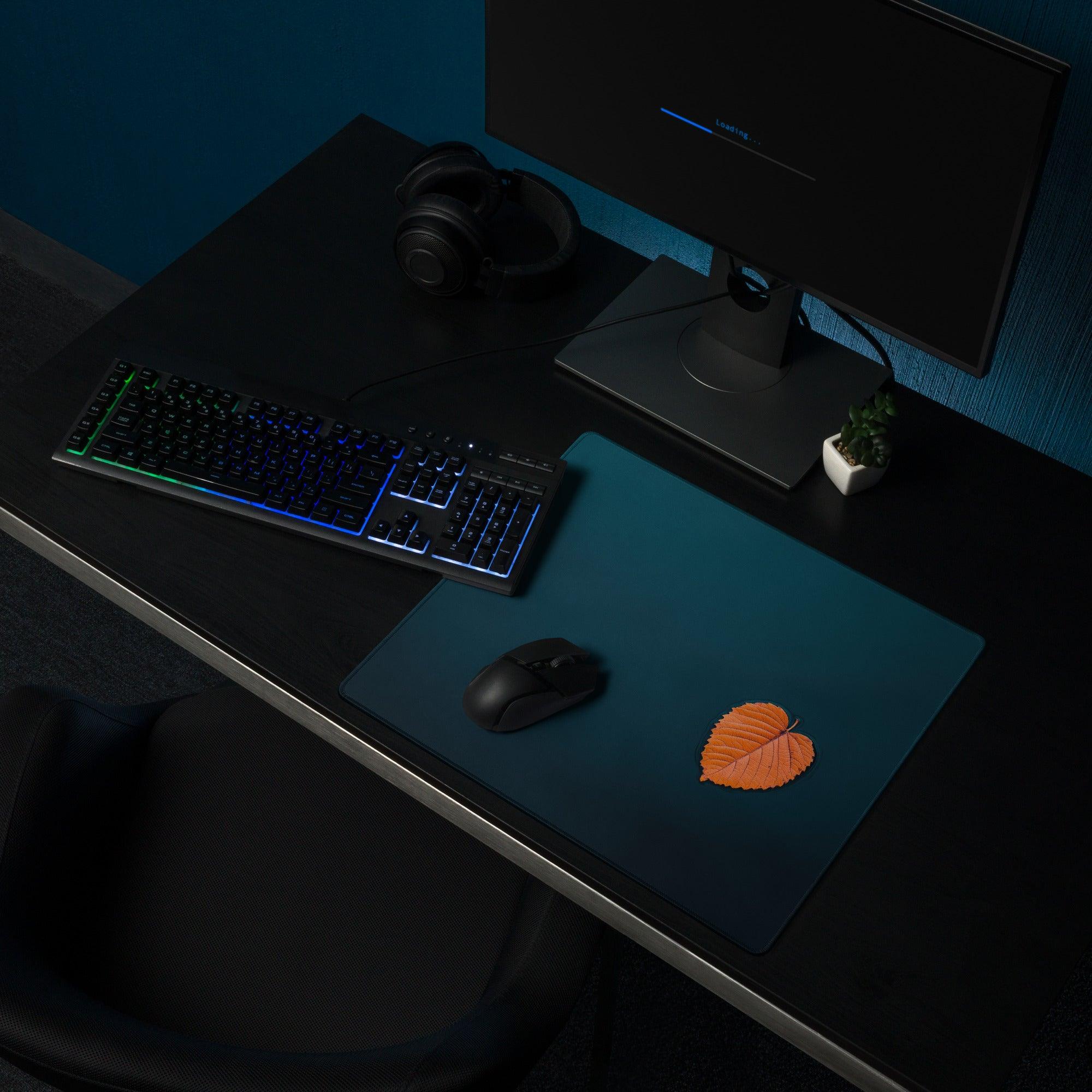Orange leaf-shaped professional large gaming mouse pad in deep ocean blue