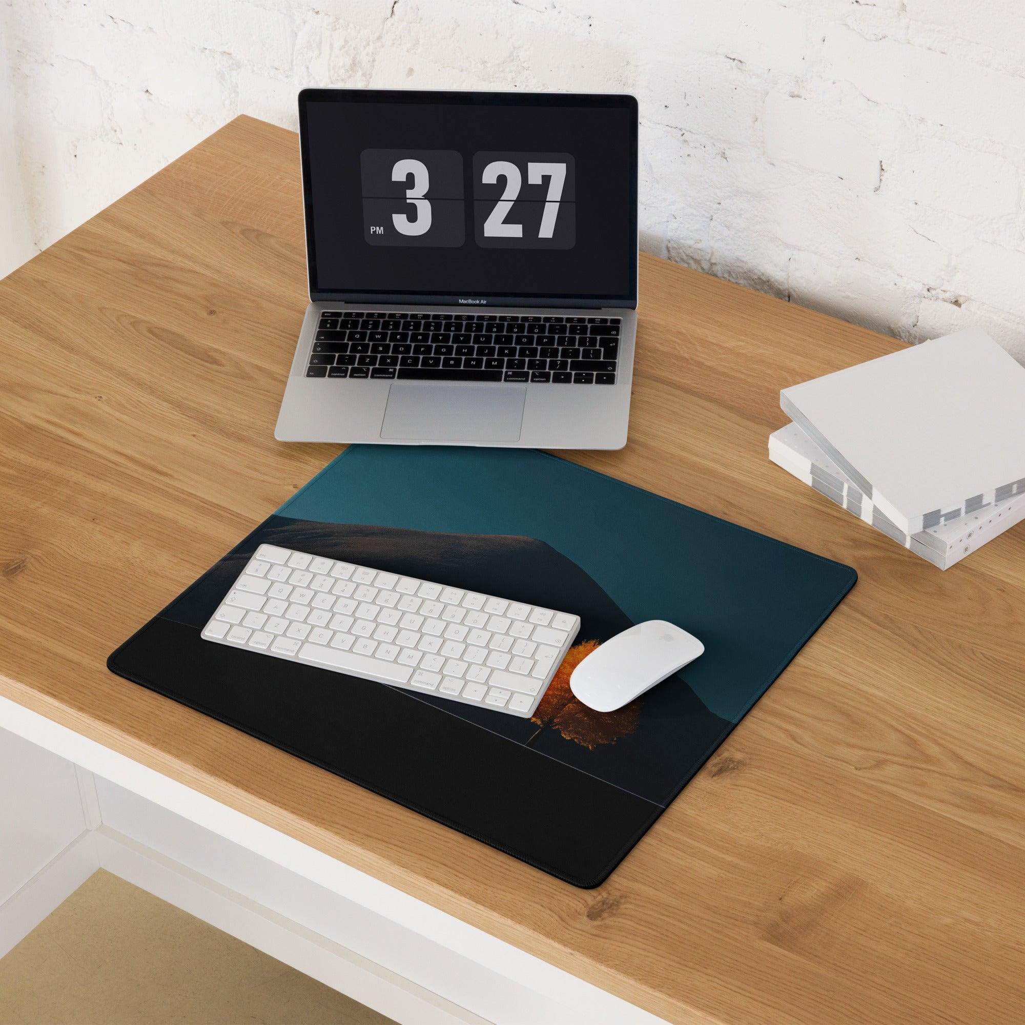 Dark teal black mountain landscape mousepad with orange-brown rock formation