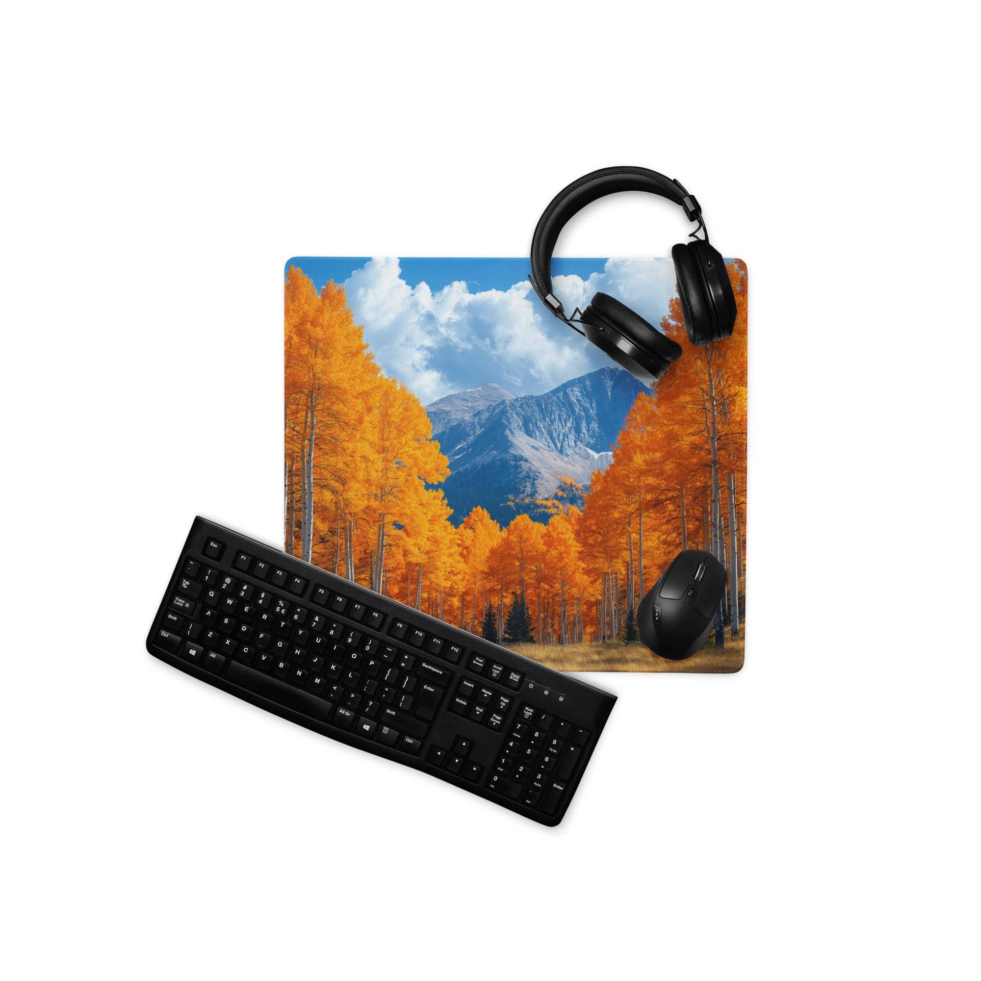 Nature-inspired autumn forest orange gaming mouse pad with headphones