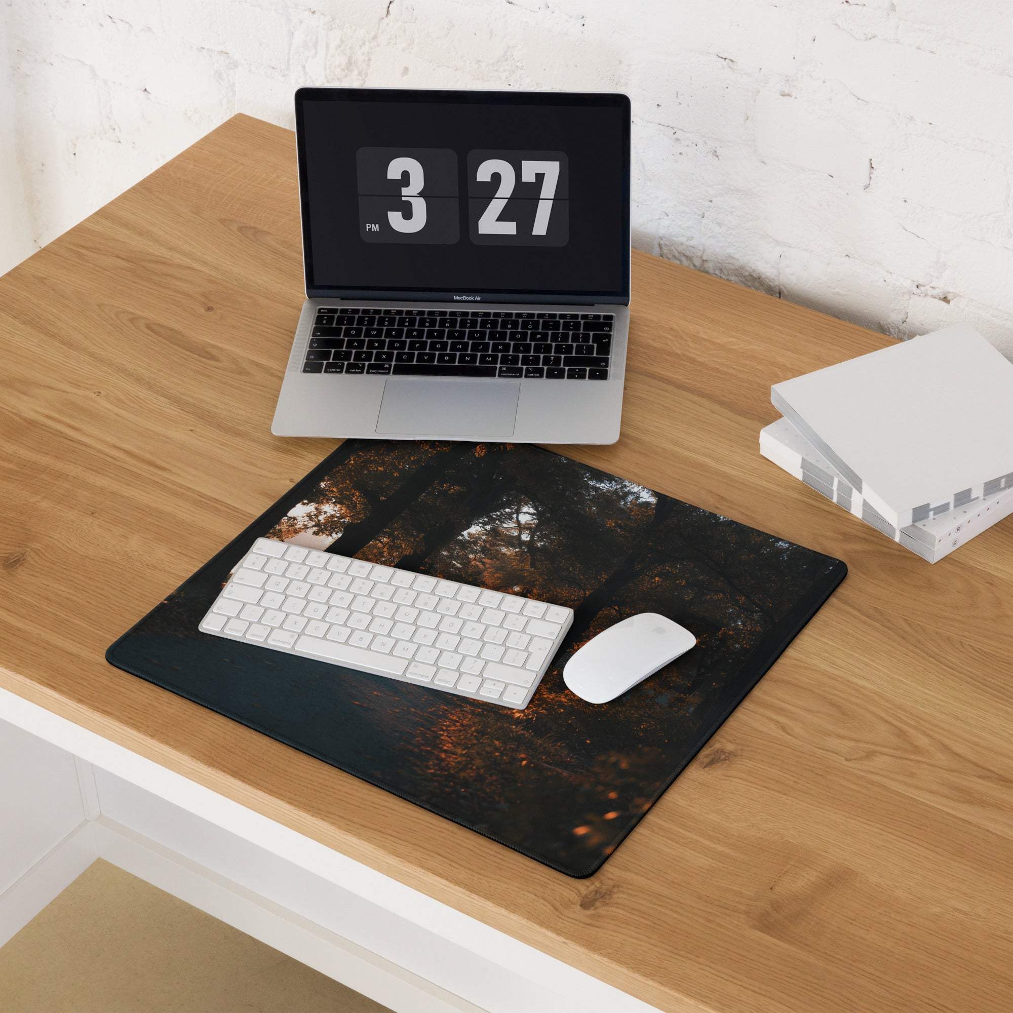 Large black forest gaming mouse pad with glossy finish, autumn glow, non-slip backing