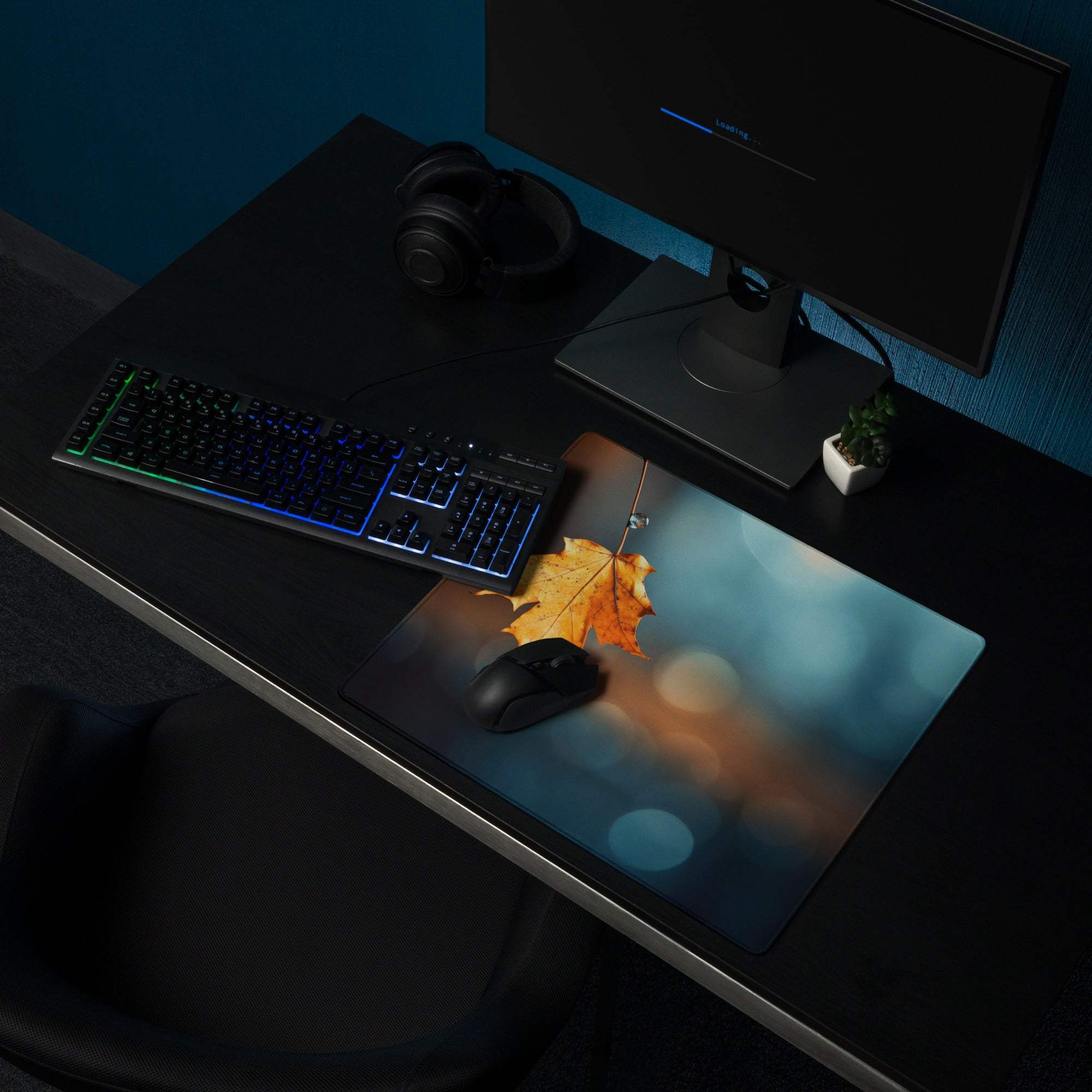 Autumn leaf gaming mouse pad with warm colors, non-slip base, stitched edges