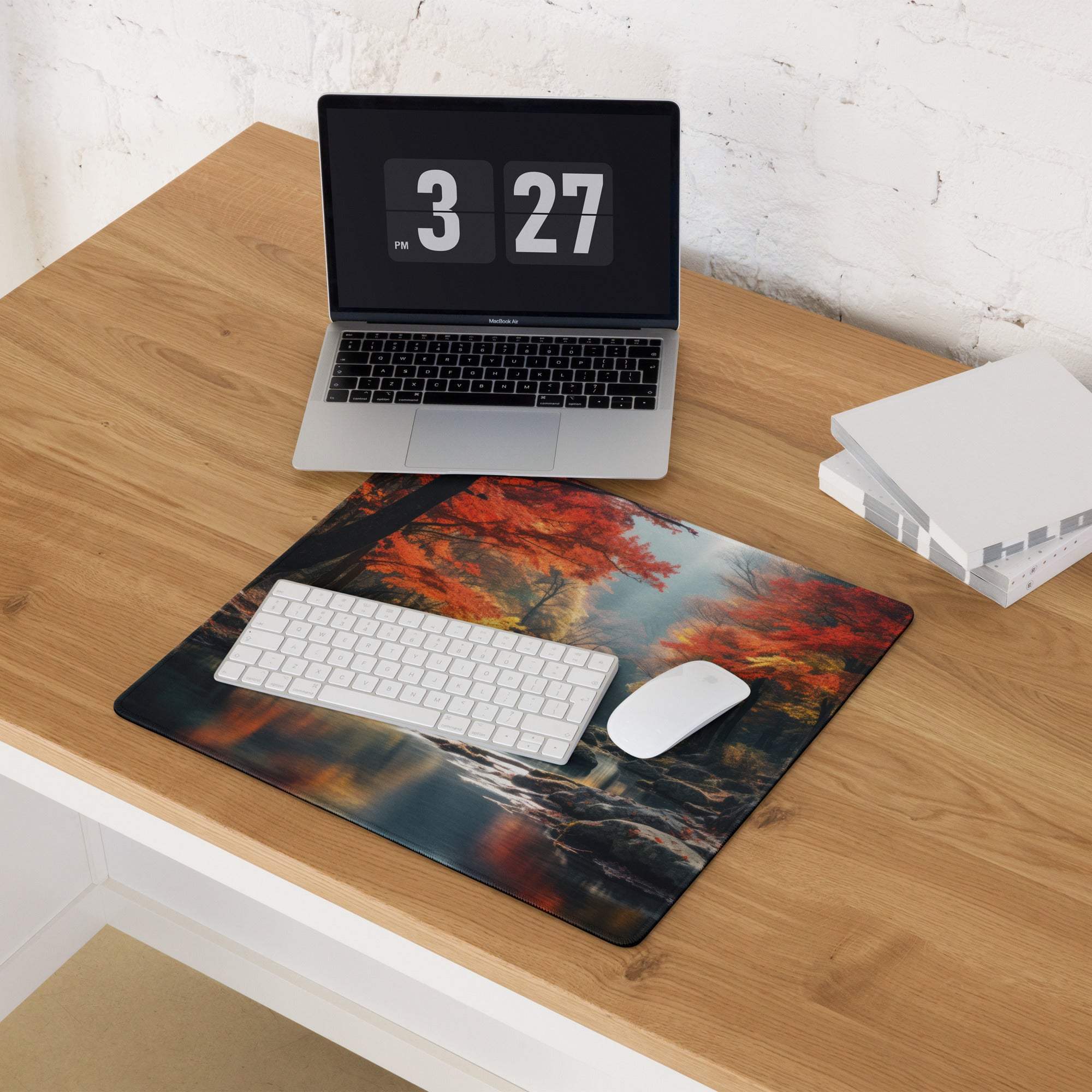 Immersive autumn forest gaming mouse pad with fiery red orange leaves on desk