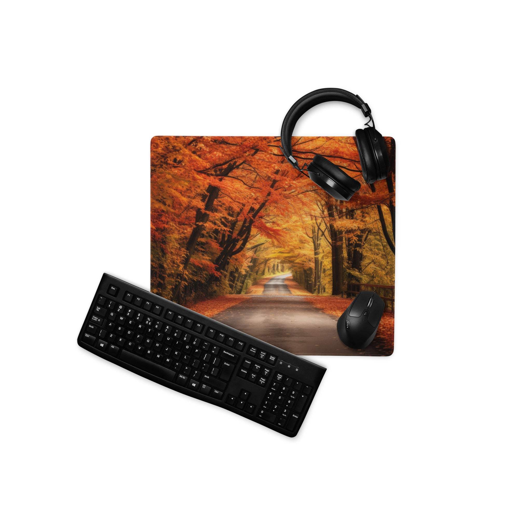 Autumn Forest large gaming mousepad with orange-yellow path, headphones on top