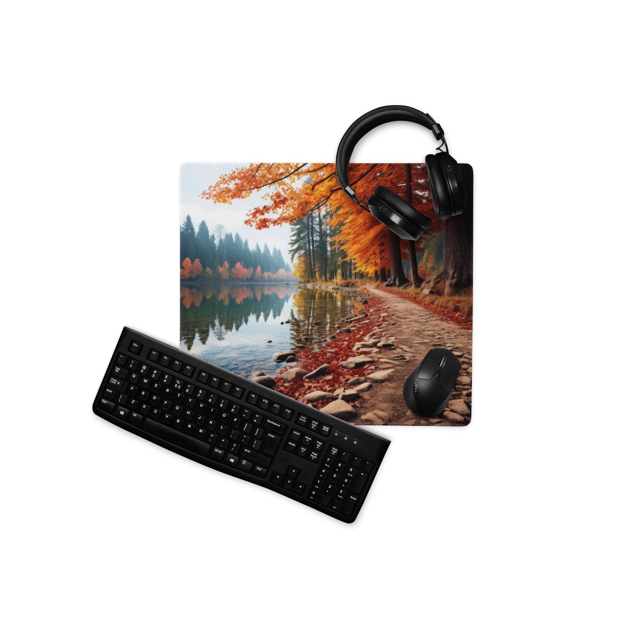 Black matte keyboard on Autumn Forest cozy gaming desk mat