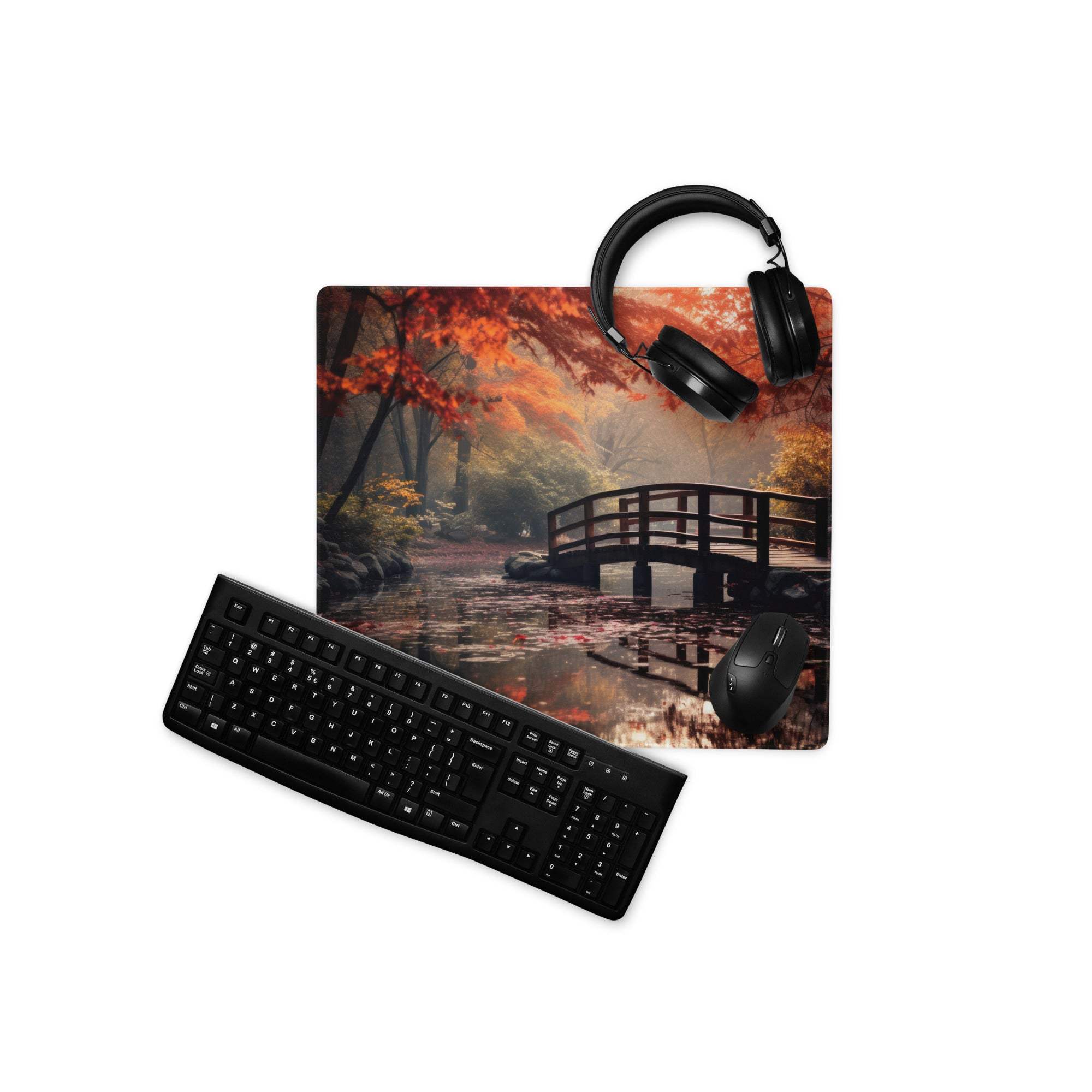 Black matte finish QWERTY keyboard on Autumn Forest Bridge mouse pad