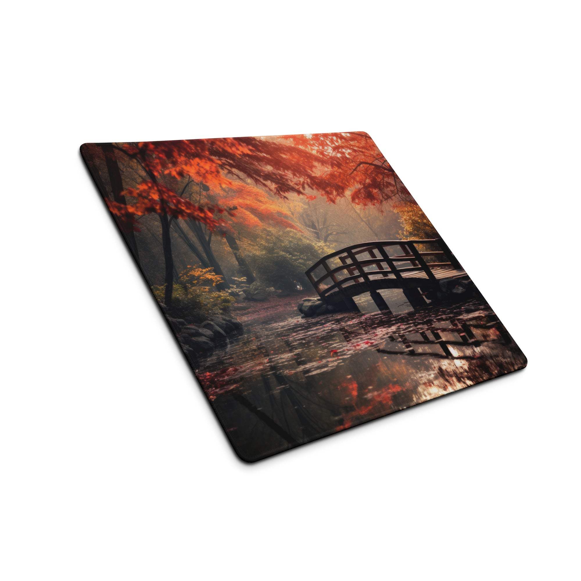 Large gaming mouse pad with autumn forest bridge over misty stream