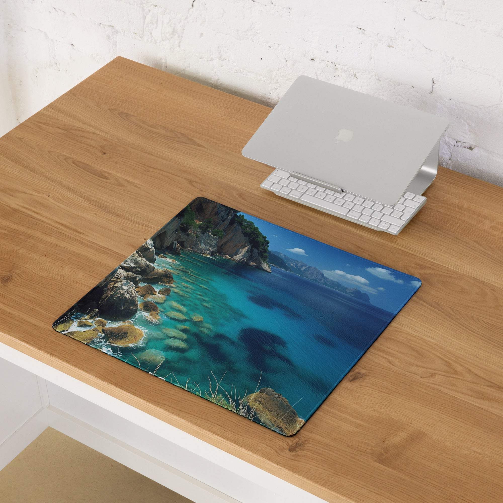 Large professional calm ocean blue gaming mouse pad with vibrant coastal scene