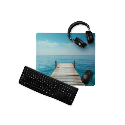 Calm ocean dock gaming mouse pad with headphones, keyboard, non-slip backing