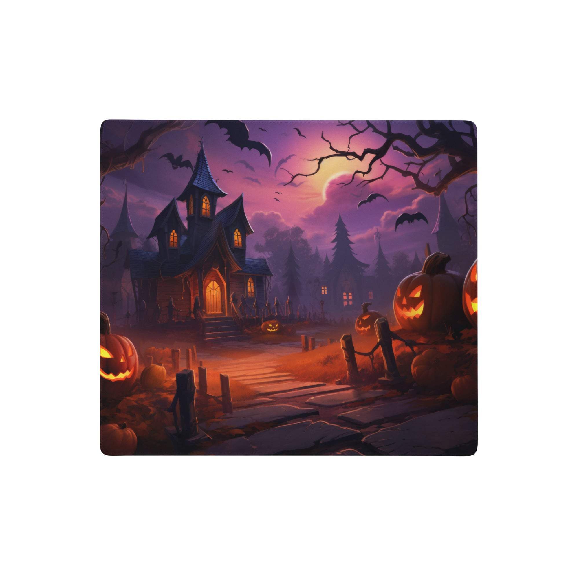 Haunted halloween mouse pad with spooky haunted house glowing jack o lanterns and bats on purple orange desk decor
