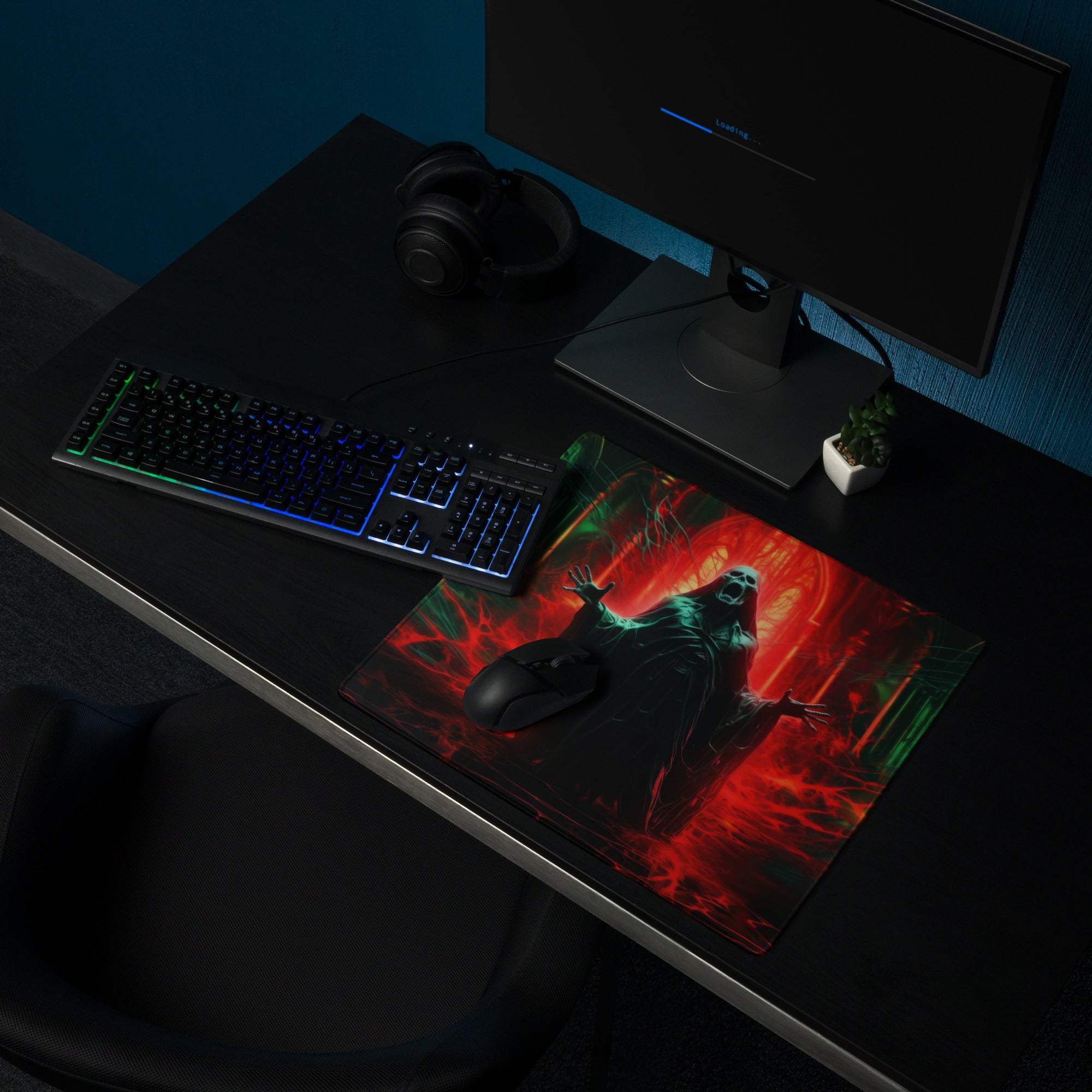 Dark gothic neon red green gaming mouse pad with hooded figure fiery backdrop