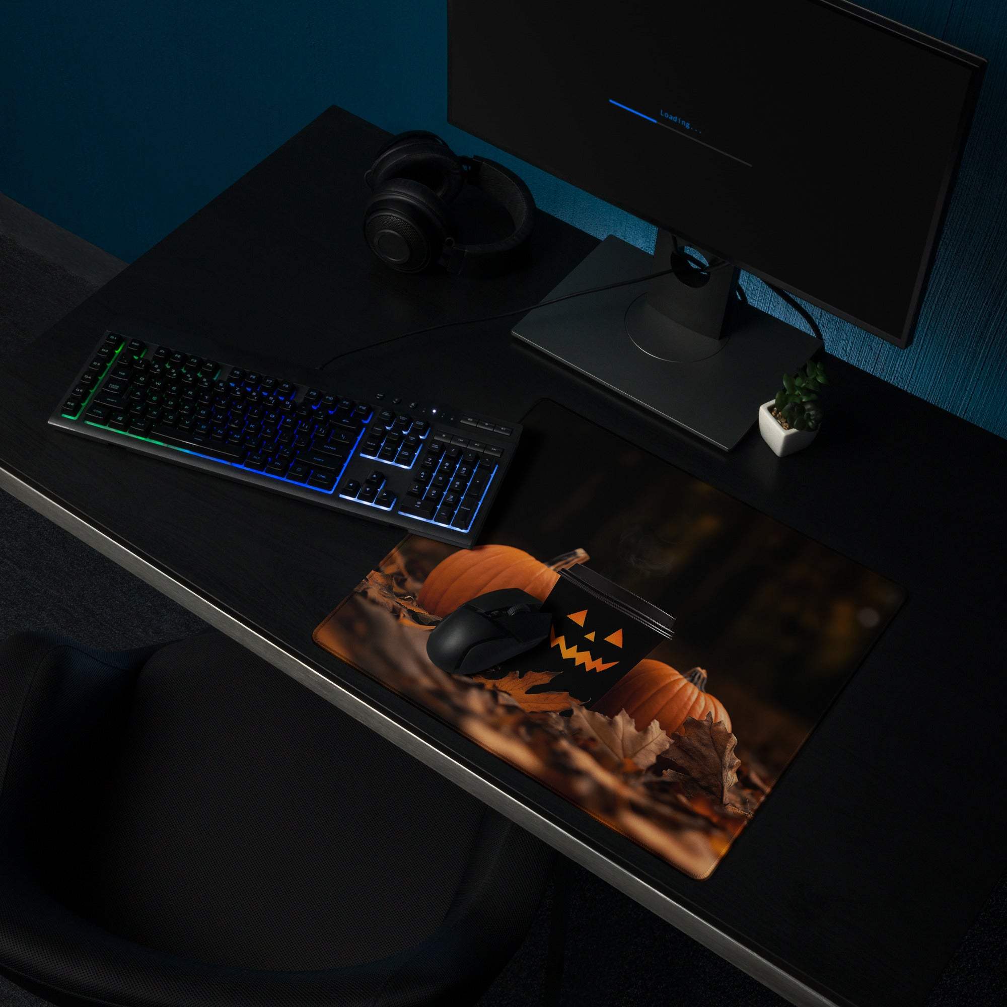 Halloween gaming mouse pad with orange pumpkins, black jack-o-lantern, glossy finish