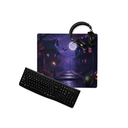 Black Halloween gaming mousepad with moonlit spooky street, bats, haunted houses