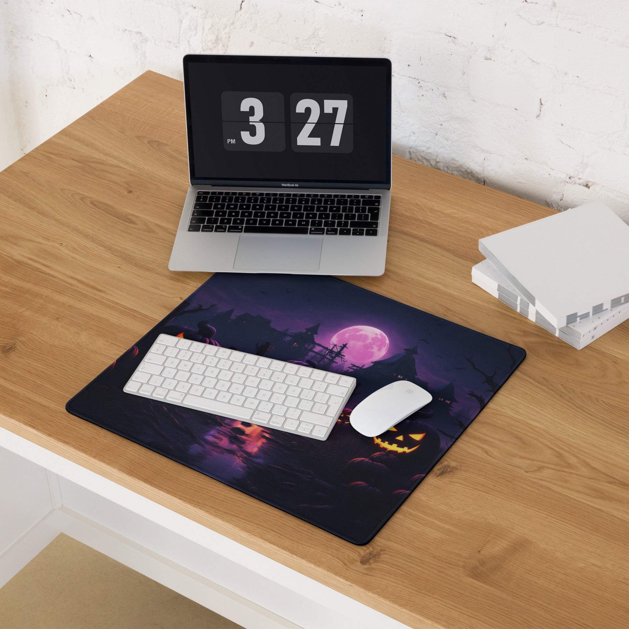 Black Halloween mousepad with purple moon jack-o-lantern design