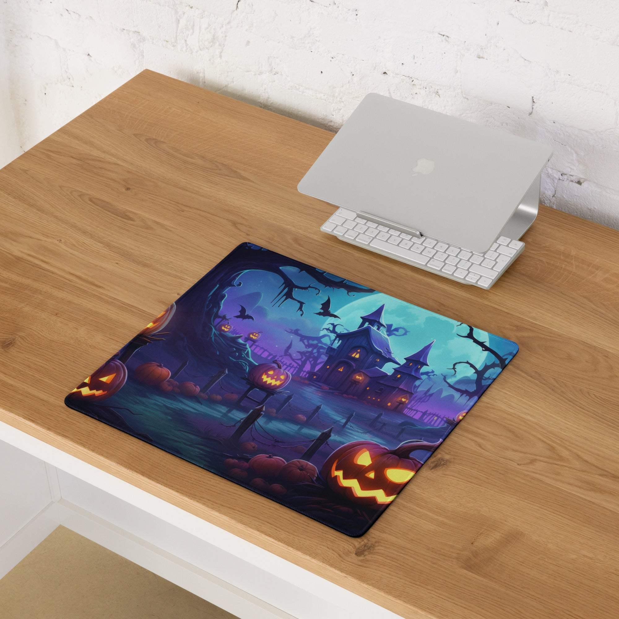 Halloween gaming mouse pad with haunted house, jack-o-lanterns, bats, purple moon