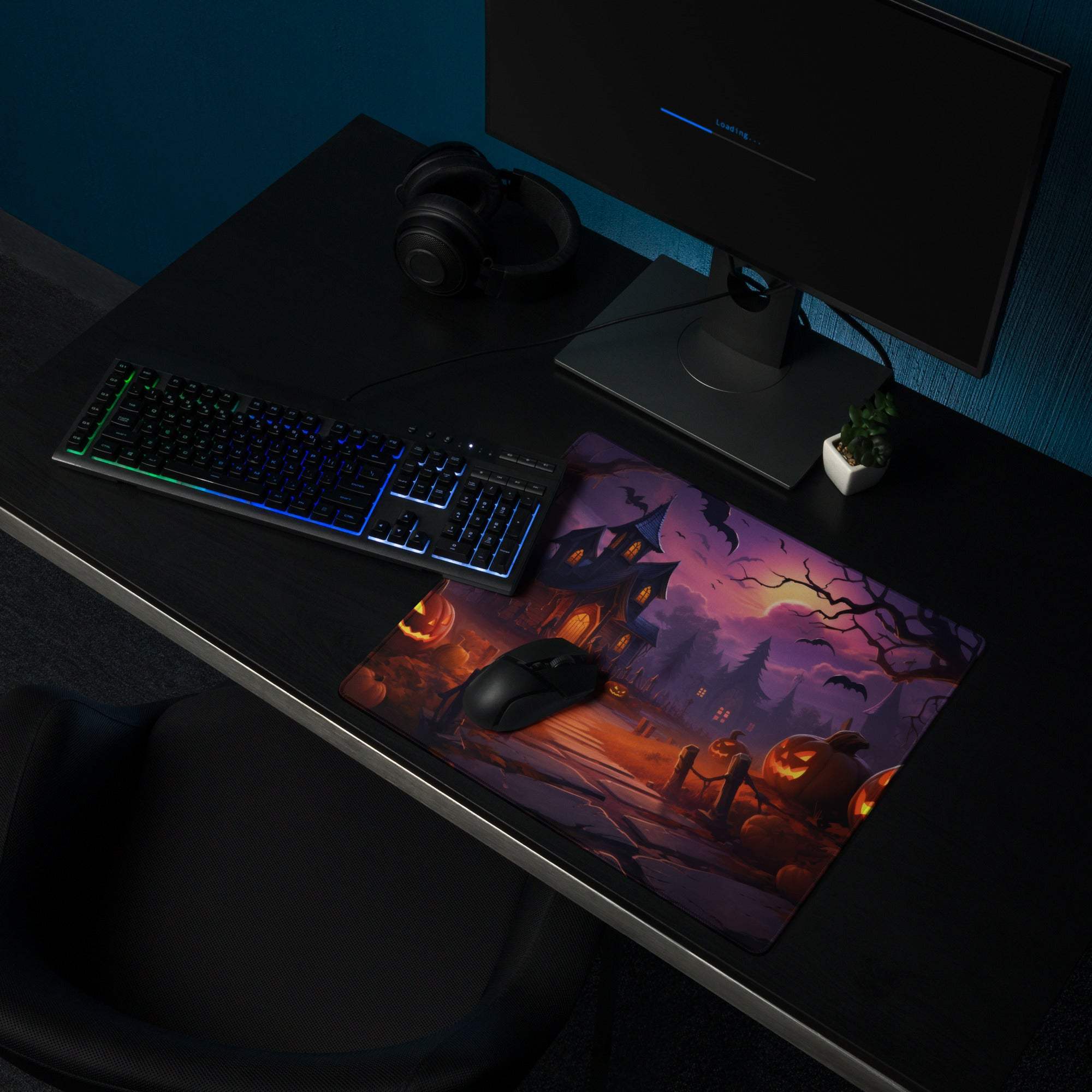Spooky Halloween haunted house gaming mouse pad with glowing pumpkins and bats