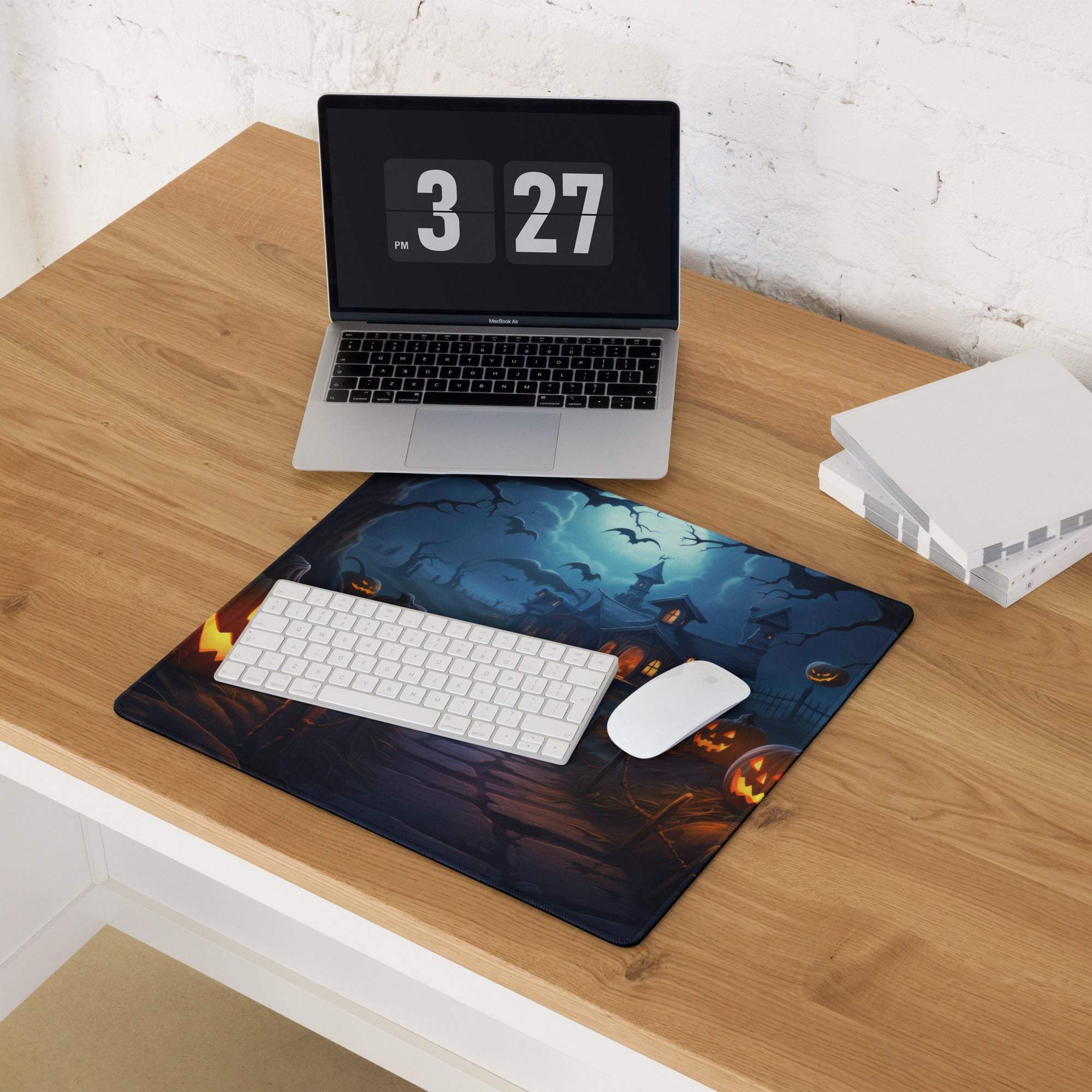 Spooky Halloween haunted house gaming mouse pad with glowing jack-o-lanterns and bats