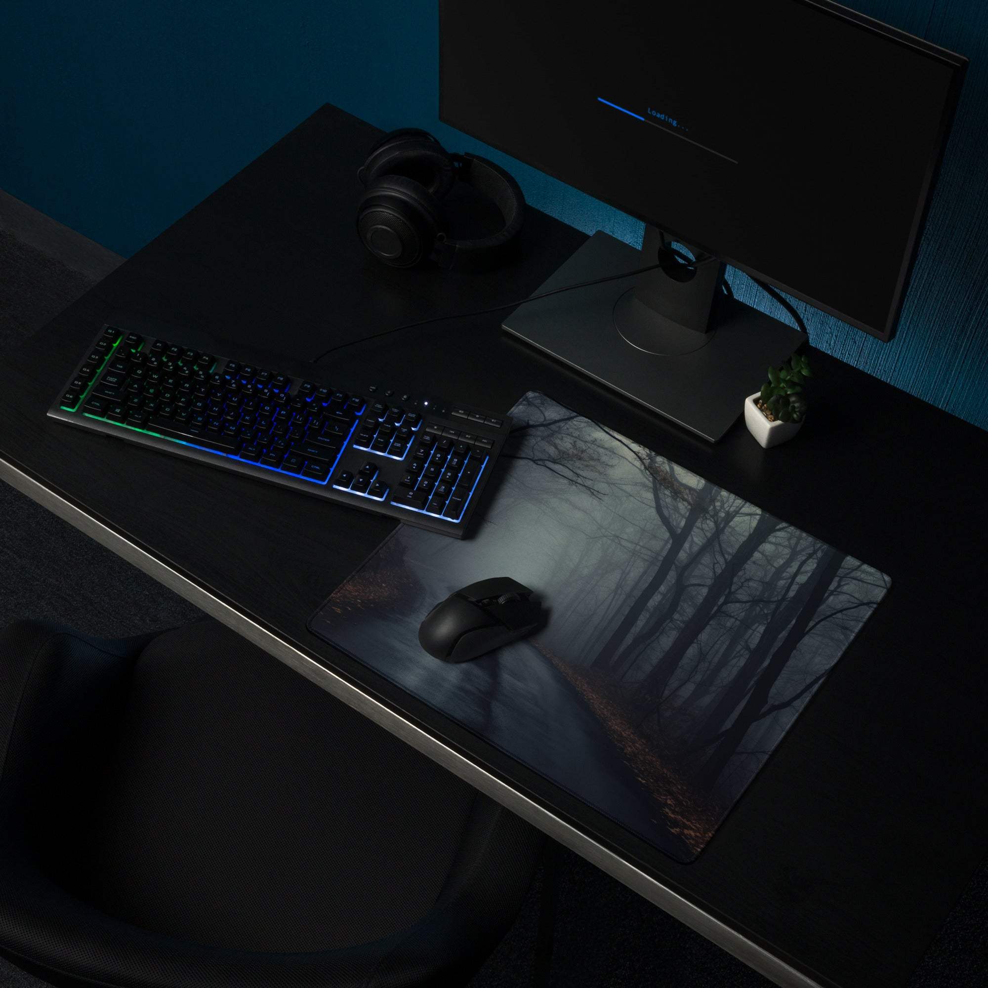 Dark forest gaming mouse pad with misty silhouetted trees and path