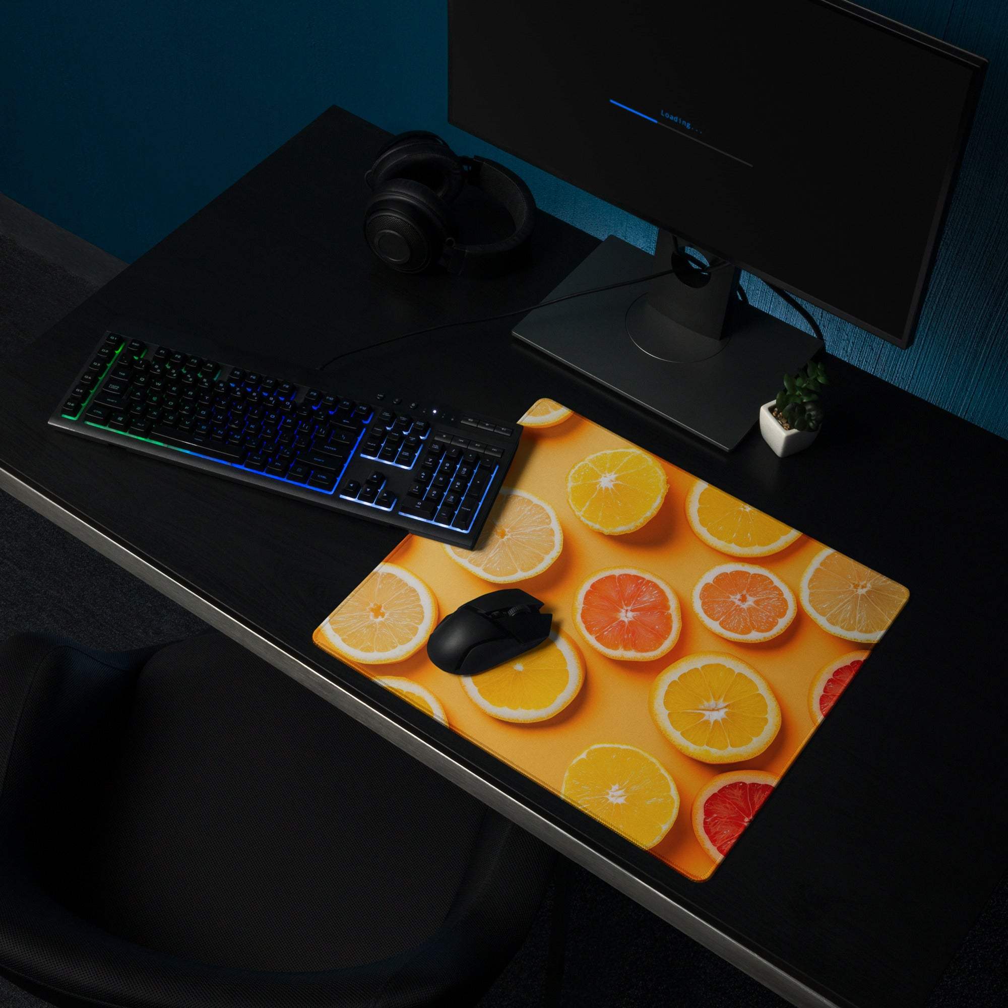 Vibrant orange citrus slice gaming mouse pad, large size, non-slip backing, glossy finish