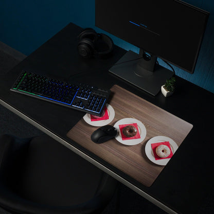 Black RGB gaming keyboard on wood grain brown large mouse pad