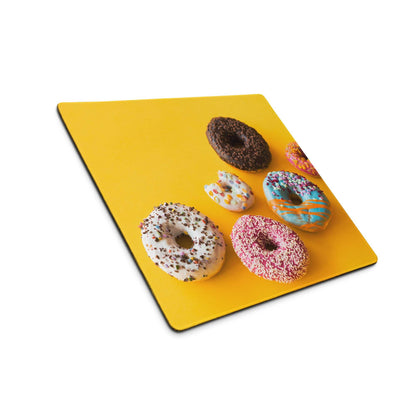 Vibrant yellow gaming mousepad with colorful sprinkled donuts