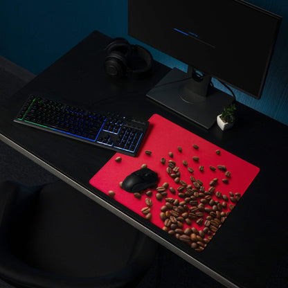 Bold red coffee bean themed gaming mouse pad with black mouse on large non-slip surface