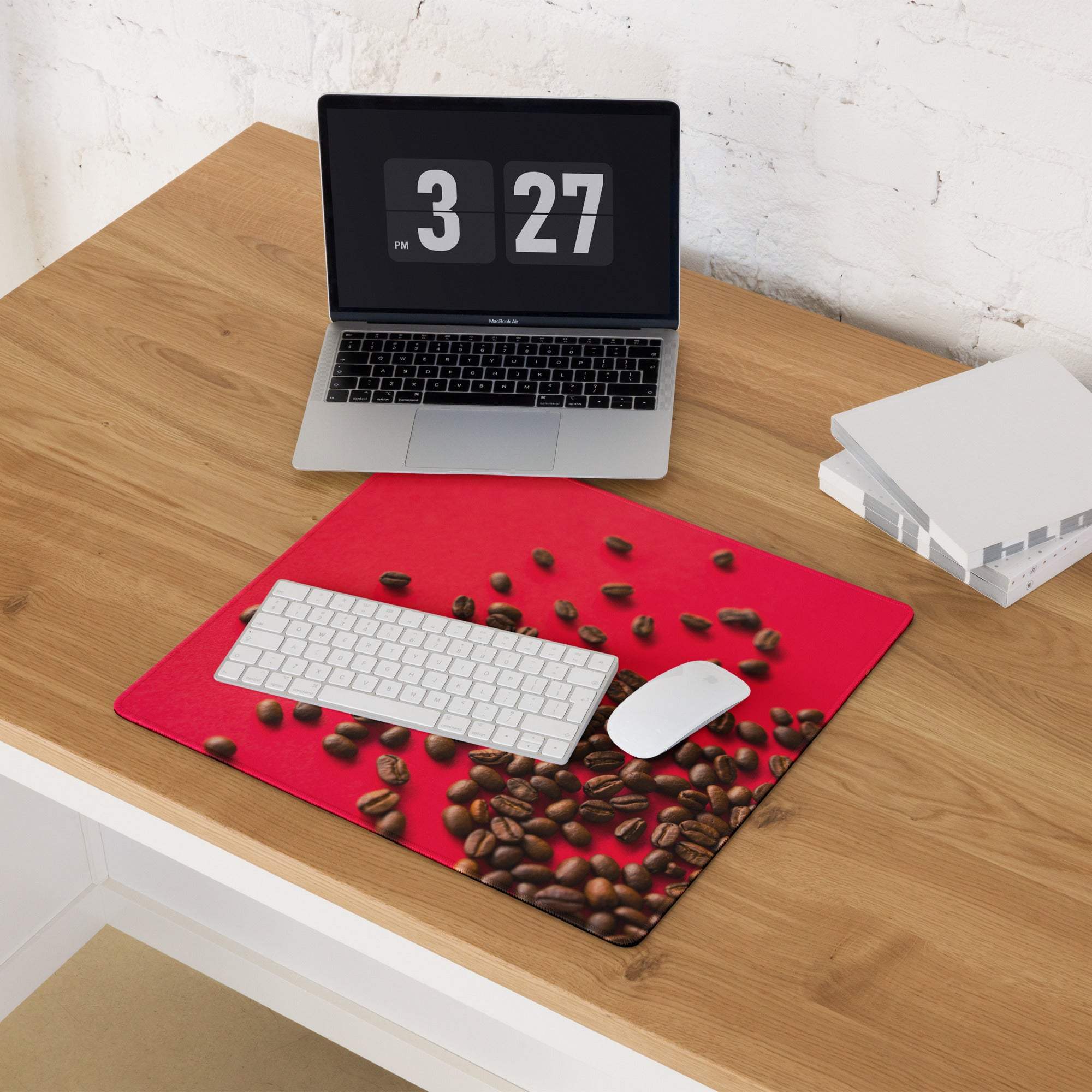 Bold red coffee bean themed gaming mouse pad with white keyboard and mouse
