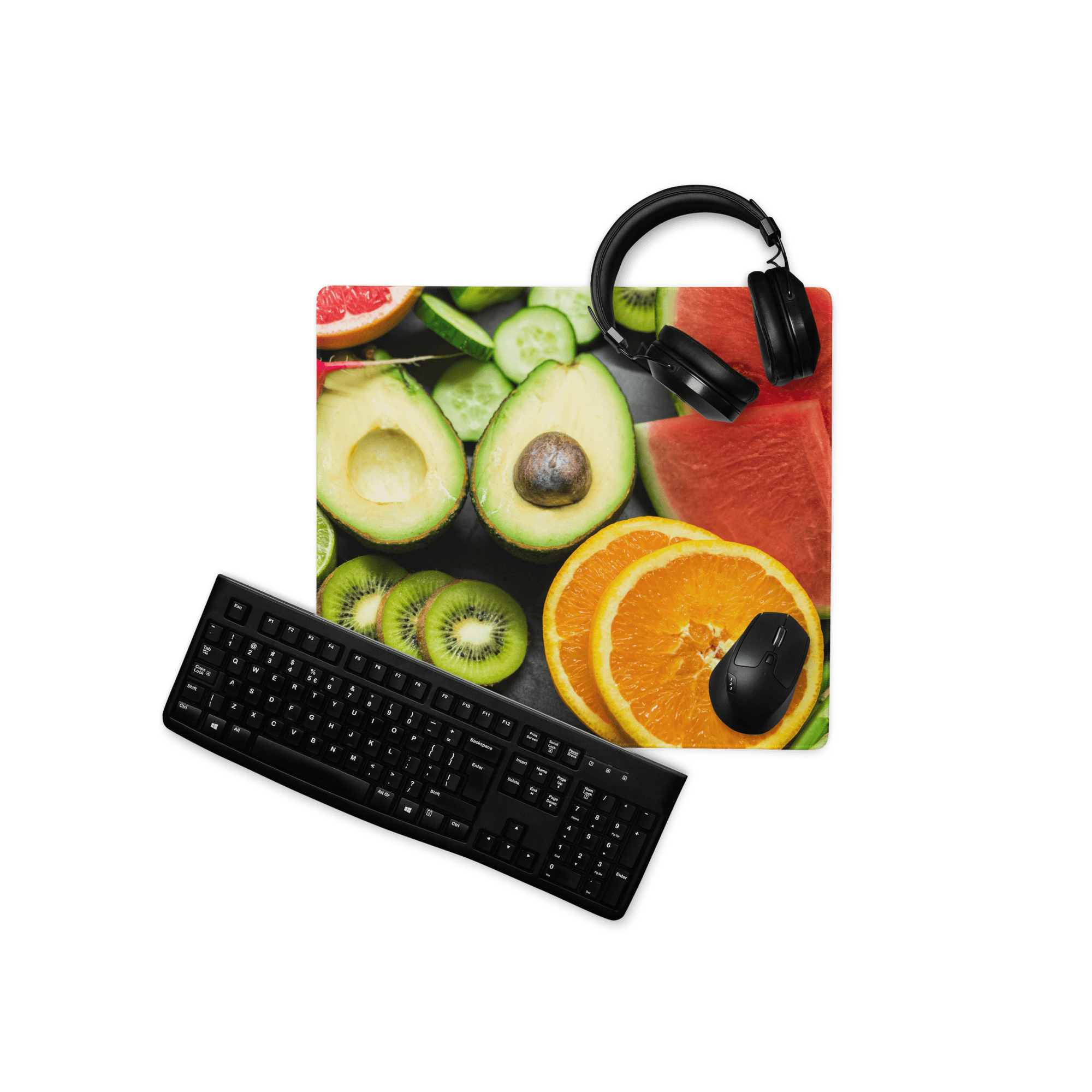 Black matte keyboard on vibrant avocado kiwi watermelon fruit mousepad