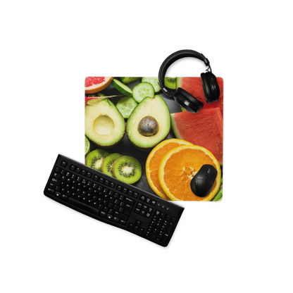 Black matte keyboard on vibrant avocado kiwi watermelon fruit mousepad