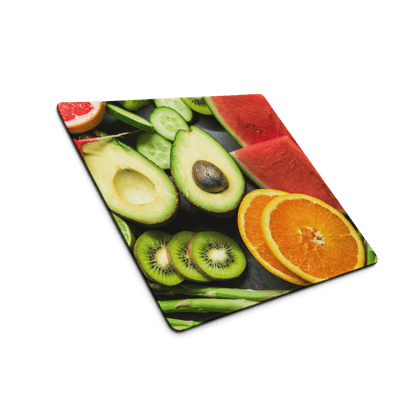 Vibrant sliced avocado kiwi orange watermelon on gaming mouse pad