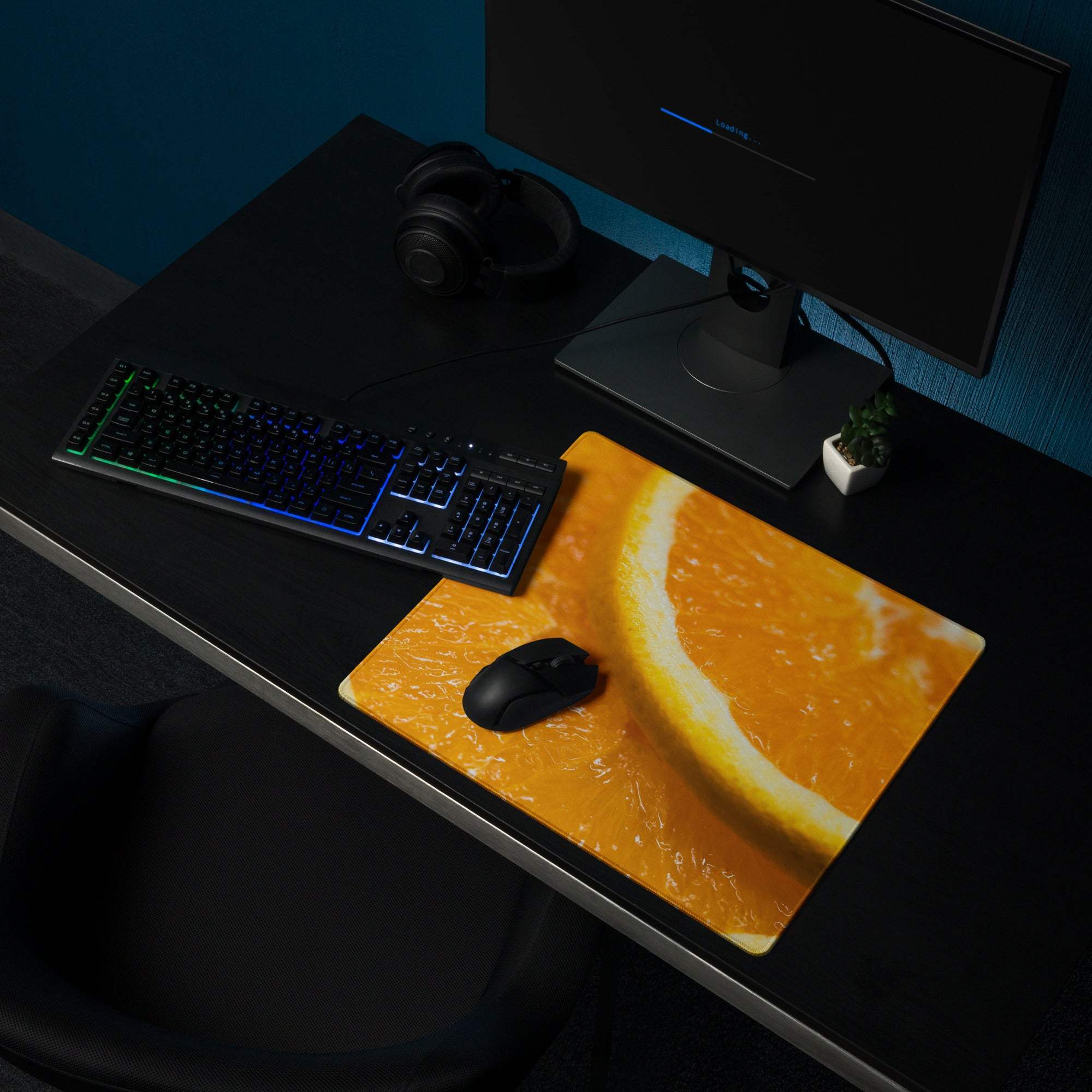 Vibrant orange slice gaming mouse pad with large surface and non-slip base