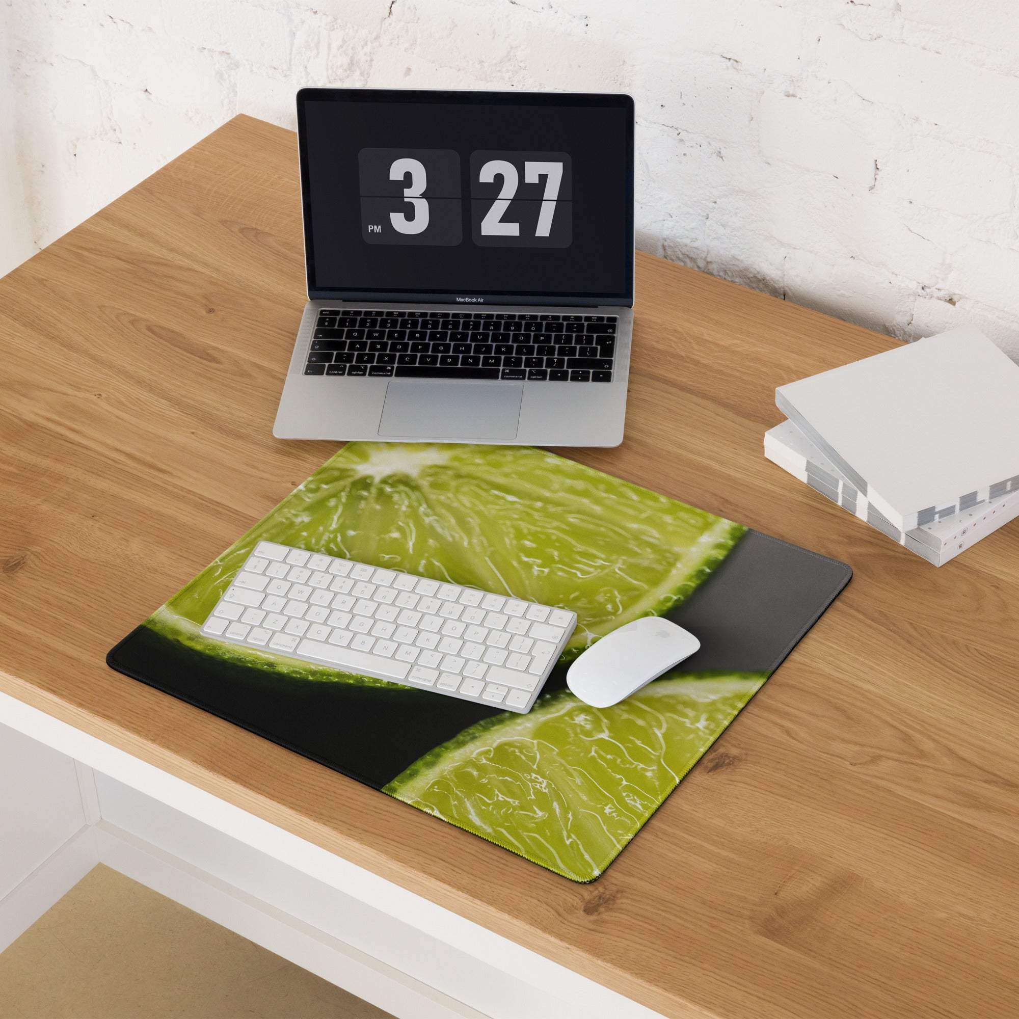 Vibrant lime slice gaming mouse pad with green black design, non-slip backing, stitched edges