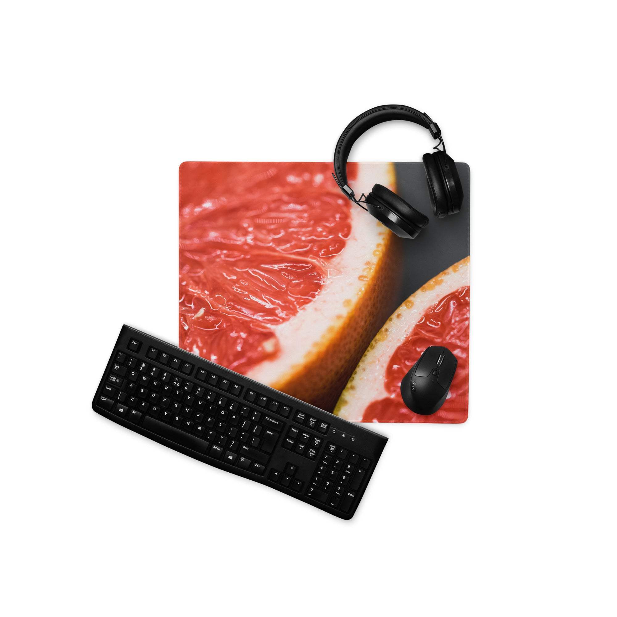 Vibrant grapefruit gaming mouse pad with glossy citrus glow and non-slip stitching